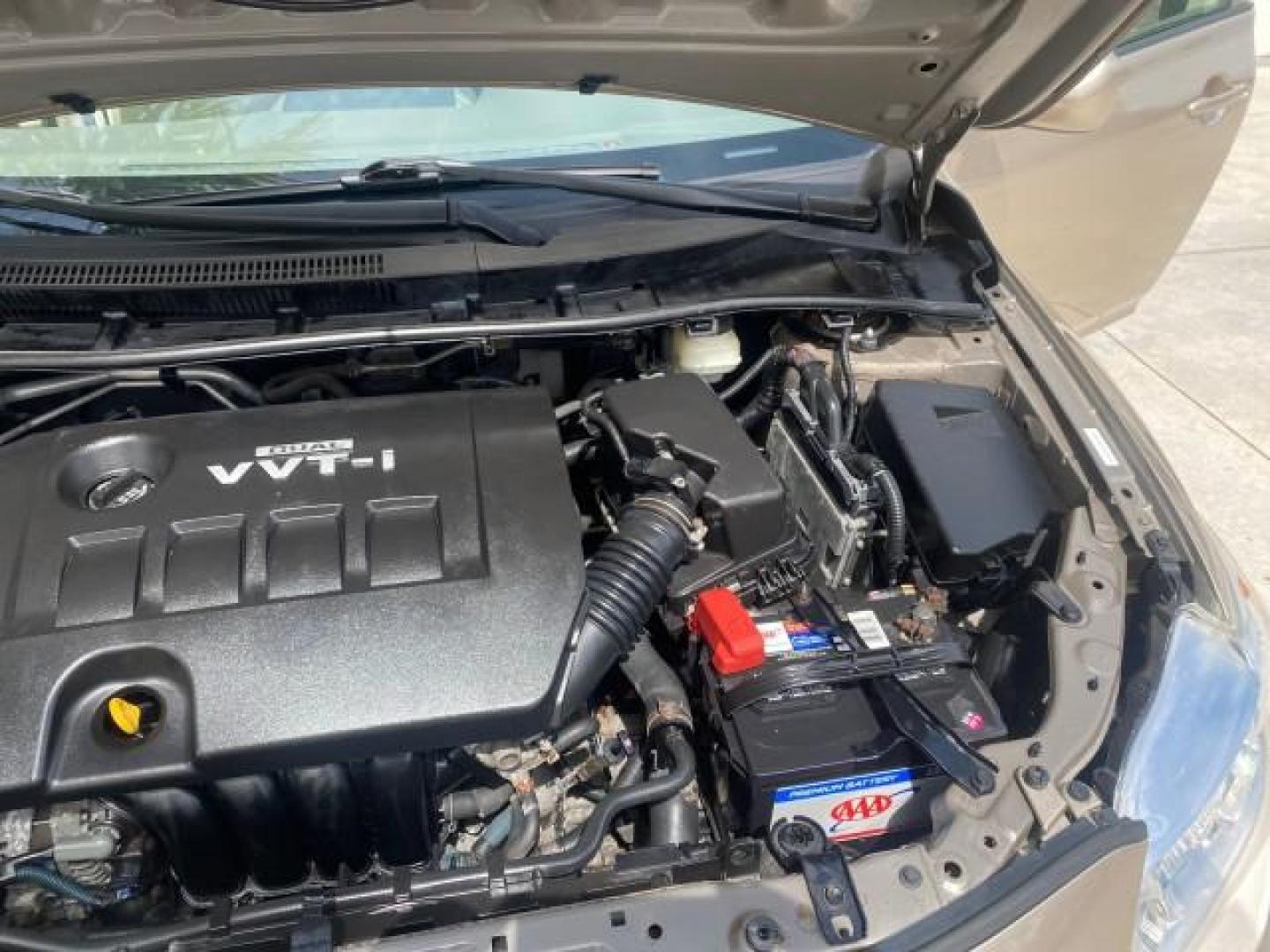 2010 Desert Sand Mica /Bisque Toyota Corolla LE LOW MILES 37,834 (1NXBU4EE1AZ) with an 1.8L DOHC SFI 16-Valve VVT-i 4-Cyl Engine engine, Automatic transmission, located at 4701 North Dixie Hwy, Pompano Beach, FL, 33064, (954) 422-2889, 26.240938, -80.123474 - OUR WEBPAGE FLORIDACARS1.COM HAS OVER 100 PHOTOS AND FREE CARFAX LINK 2010 TOYOTA COROLLA LE 35 mpg VIN: 1NXBU4EE1AZ270742 1 N X B U 4 E E 1 A Z 2 7 0 7 4 2 SEDAN 4 DR 1.8L I4 F DOHC 16V GASOLINE FRONT WHEEL DRIVE Top Features Cloth Seats Satellite Radio Ready Basic Features ABS Brakes AM/FM Stereo - Photo#26