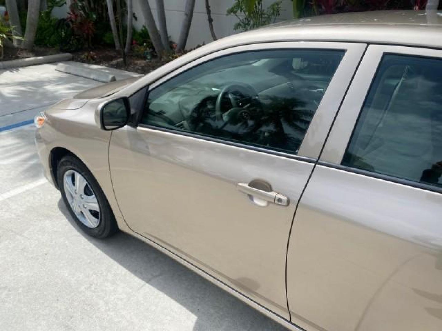 2010 Desert Sand Mica /Bisque Toyota Corolla LE LOW MILES 37,834 (1NXBU4EE1AZ) with an 1.8L DOHC SFI 16-Valve VVT-i 4-Cyl Engine engine, Automatic transmission, located at 4701 North Dixie Hwy, Pompano Beach, FL, 33064, (954) 422-2889, 26.240938, -80.123474 - OUR WEBPAGE FLORIDACARS1.COM HAS OVER 100 PHOTOS AND FREE CARFAX LINK 2010 TOYOTA COROLLA LE 35 mpg VIN: 1NXBU4EE1AZ270742 1 N X B U 4 E E 1 A Z 2 7 0 7 4 2 SEDAN 4 DR 1.8L I4 F DOHC 16V GASOLINE FRONT WHEEL DRIVE Top Features Cloth Seats Satellite Radio Ready Basic Features ABS Brakes AM/FM Stereo - Photo#27