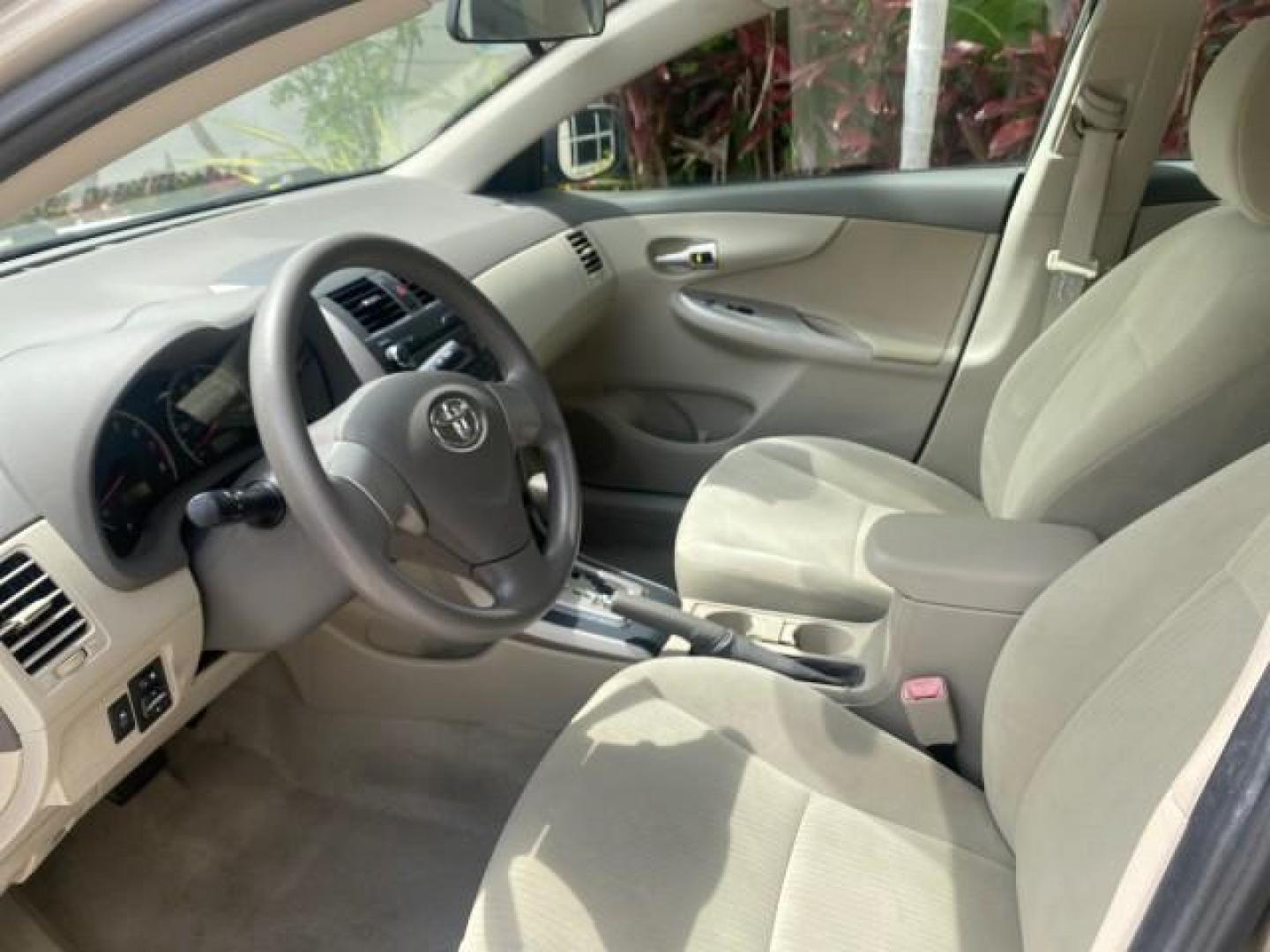 2010 Desert Sand Mica /Bisque Toyota Corolla LE LOW MILES 37,834 (1NXBU4EE1AZ) with an 1.8L DOHC SFI 16-Valve VVT-i 4-Cyl Engine engine, Automatic transmission, located at 4701 North Dixie Hwy, Pompano Beach, FL, 33064, (954) 422-2889, 26.240938, -80.123474 - OUR WEBPAGE FLORIDACARS1.COM HAS OVER 100 PHOTOS AND FREE CARFAX LINK 2010 TOYOTA COROLLA LE 35 mpg VIN: 1NXBU4EE1AZ270742 1 N X B U 4 E E 1 A Z 2 7 0 7 4 2 SEDAN 4 DR 1.8L I4 F DOHC 16V GASOLINE FRONT WHEEL DRIVE Top Features Cloth Seats Satellite Radio Ready Basic Features ABS Brakes AM/FM Stereo - Photo#34