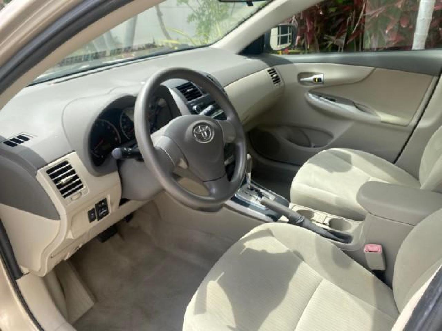 2010 Desert Sand Mica /Bisque Toyota Corolla LE LOW MILES 37,834 (1NXBU4EE1AZ) with an 1.8L DOHC SFI 16-Valve VVT-i 4-Cyl Engine engine, Automatic transmission, located at 4701 North Dixie Hwy, Pompano Beach, FL, 33064, (954) 422-2889, 26.240938, -80.123474 - OUR WEBPAGE FLORIDACARS1.COM HAS OVER 100 PHOTOS AND FREE CARFAX LINK 2010 TOYOTA COROLLA LE 35 mpg VIN: 1NXBU4EE1AZ270742 1 N X B U 4 E E 1 A Z 2 7 0 7 4 2 SEDAN 4 DR 1.8L I4 F DOHC 16V GASOLINE FRONT WHEEL DRIVE Top Features Cloth Seats Satellite Radio Ready Basic Features ABS Brakes AM/FM Stereo - Photo#35