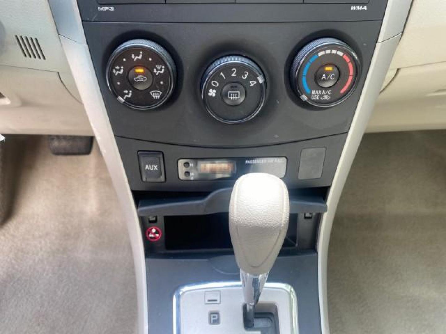 2010 Desert Sand Mica /Bisque Toyota Corolla LE LOW MILES 37,834 (1NXBU4EE1AZ) with an 1.8L DOHC SFI 16-Valve VVT-i 4-Cyl Engine engine, Automatic transmission, located at 4701 North Dixie Hwy, Pompano Beach, FL, 33064, (954) 422-2889, 26.240938, -80.123474 - OUR WEBPAGE FLORIDACARS1.COM HAS OVER 100 PHOTOS AND FREE CARFAX LINK 2010 TOYOTA COROLLA LE 35 mpg VIN: 1NXBU4EE1AZ270742 1 N X B U 4 E E 1 A Z 2 7 0 7 4 2 SEDAN 4 DR 1.8L I4 F DOHC 16V GASOLINE FRONT WHEEL DRIVE Top Features Cloth Seats Satellite Radio Ready Basic Features ABS Brakes AM/FM Stereo - Photo#47