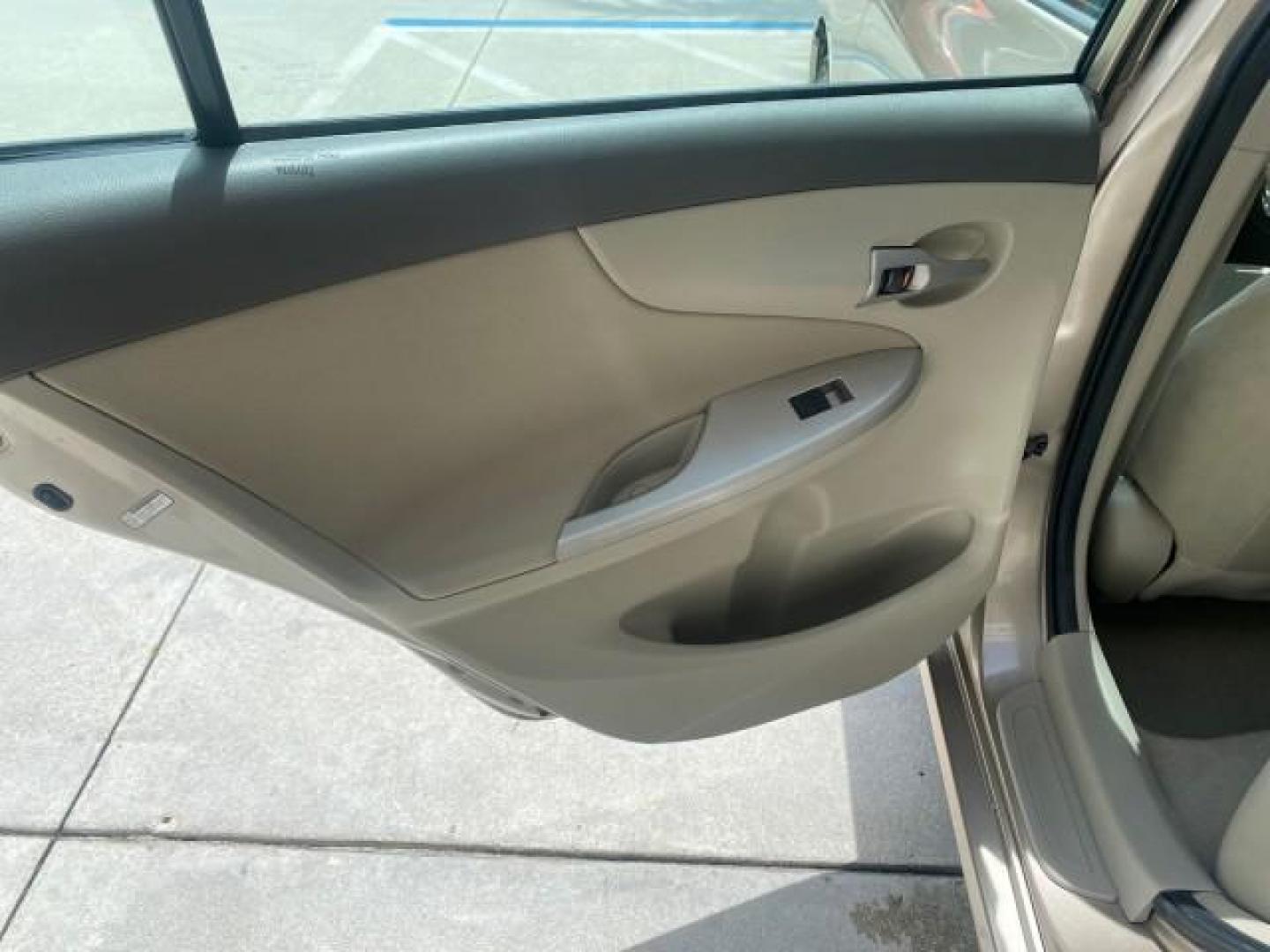 2010 Desert Sand Mica /Bisque Toyota Corolla LE LOW MILES 37,834 (1NXBU4EE1AZ) with an 1.8L DOHC SFI 16-Valve VVT-i 4-Cyl Engine engine, Automatic transmission, located at 4701 North Dixie Hwy, Pompano Beach, FL, 33064, (954) 422-2889, 26.240938, -80.123474 - OUR WEBPAGE FLORIDACARS1.COM HAS OVER 100 PHOTOS AND FREE CARFAX LINK 2010 TOYOTA COROLLA LE 35 mpg VIN: 1NXBU4EE1AZ270742 1 N X B U 4 E E 1 A Z 2 7 0 7 4 2 SEDAN 4 DR 1.8L I4 F DOHC 16V GASOLINE FRONT WHEEL DRIVE Top Features Cloth Seats Satellite Radio Ready Basic Features ABS Brakes AM/FM Stereo - Photo#64