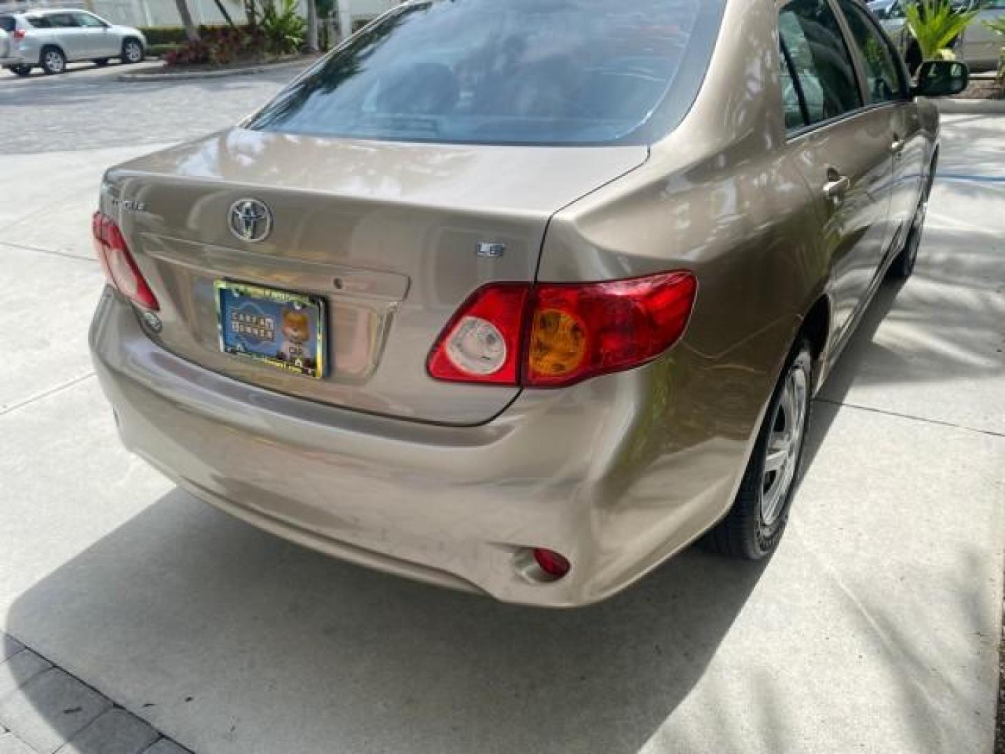 2010 Desert Sand Mica /Bisque Toyota Corolla LE LOW MILES 37,834 (1NXBU4EE1AZ) with an 1.8L DOHC SFI 16-Valve VVT-i 4-Cyl Engine engine, Automatic transmission, located at 4701 North Dixie Hwy, Pompano Beach, FL, 33064, (954) 422-2889, 26.240938, -80.123474 - OUR WEBPAGE FLORIDACARS1.COM HAS OVER 100 PHOTOS AND FREE CARFAX LINK 2010 TOYOTA COROLLA LE 35 mpg VIN: 1NXBU4EE1AZ270742 1 N X B U 4 E E 1 A Z 2 7 0 7 4 2 SEDAN 4 DR 1.8L I4 F DOHC 16V GASOLINE FRONT WHEEL DRIVE Top Features Cloth Seats Satellite Radio Ready Basic Features ABS Brakes AM/FM Stereo - Photo#81