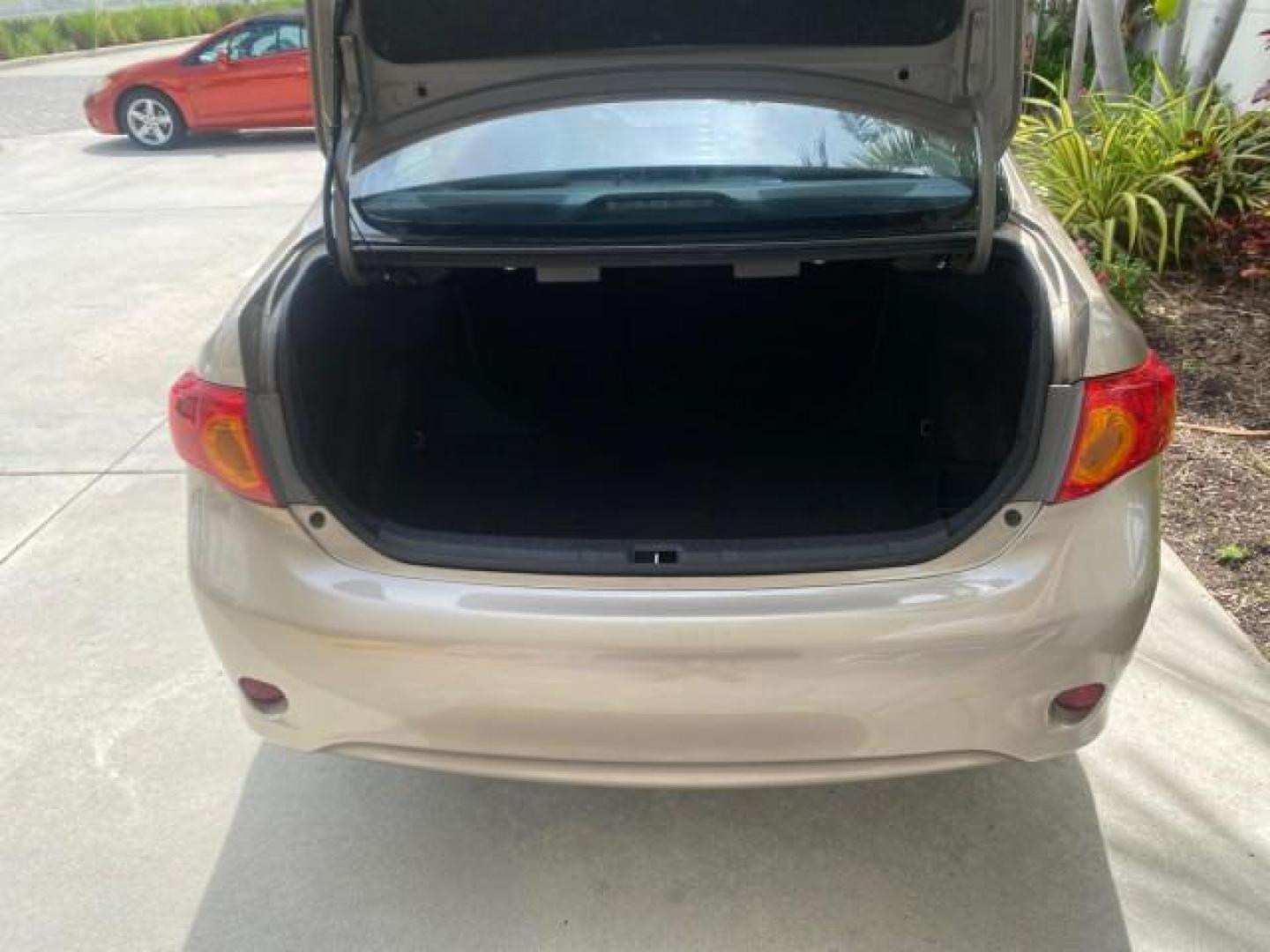 2010 Desert Sand Mica /Bisque Toyota Corolla LE LOW MILES 37,834 (1NXBU4EE1AZ) with an 1.8L DOHC SFI 16-Valve VVT-i 4-Cyl Engine engine, Automatic transmission, located at 4701 North Dixie Hwy, Pompano Beach, FL, 33064, (954) 422-2889, 26.240938, -80.123474 - OUR WEBPAGE FLORIDACARS1.COM HAS OVER 100 PHOTOS AND FREE CARFAX LINK 2010 TOYOTA COROLLA LE 35 mpg VIN: 1NXBU4EE1AZ270742 1 N X B U 4 E E 1 A Z 2 7 0 7 4 2 SEDAN 4 DR 1.8L I4 F DOHC 16V GASOLINE FRONT WHEEL DRIVE Top Features Cloth Seats Satellite Radio Ready Basic Features ABS Brakes AM/FM Stereo - Photo#83