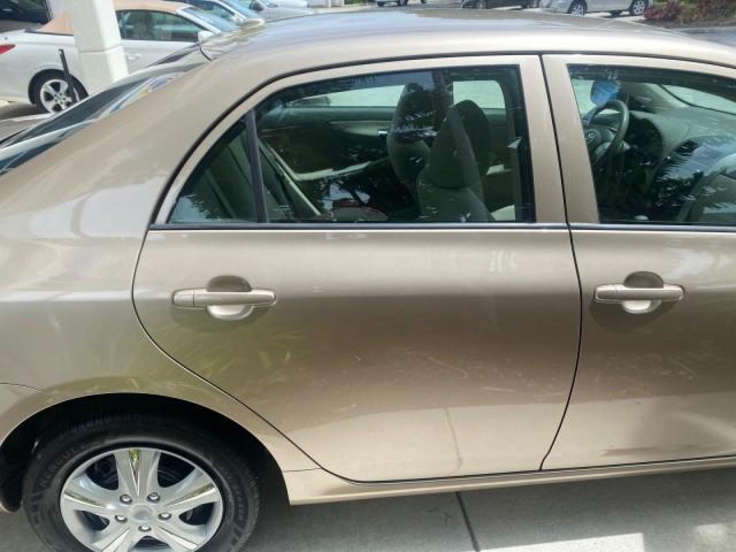 2010 Desert Sand Mica /Bisque Toyota Corolla LE LOW MILES 37,834 (1NXBU4EE1AZ) with an 1.8L DOHC SFI 16-Valve VVT-i 4-Cyl Engine engine, Automatic transmission, located at 4701 North Dixie Hwy, Pompano Beach, FL, 33064, (954) 422-2889, 26.240938, -80.123474 - OUR WEBPAGE FLORIDACARS1.COM HAS OVER 100 PHOTOS AND FREE CARFAX LINK 2010 TOYOTA COROLLA LE 35 mpg VIN: 1NXBU4EE1AZ270742 1 N X B U 4 E E 1 A Z 2 7 0 7 4 2 SEDAN 4 DR 1.8L I4 F DOHC 16V GASOLINE FRONT WHEEL DRIVE Top Features Cloth Seats Satellite Radio Ready Basic Features ABS Brakes AM/FM Stereo - Photo#90