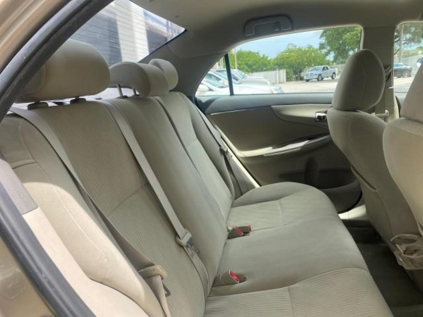 2010 Desert Sand Mica /Bisque Toyota Corolla LE LOW MILES 37,834 (1NXBU4EE1AZ) with an 1.8L DOHC SFI 16-Valve VVT-i 4-Cyl Engine engine, Automatic transmission, located at 4701 North Dixie Hwy, Pompano Beach, FL, 33064, (954) 422-2889, 26.240938, -80.123474 - OUR WEBPAGE FLORIDACARS1.COM HAS OVER 100 PHOTOS AND FREE CARFAX LINK 2010 TOYOTA COROLLA LE 35 mpg VIN: 1NXBU4EE1AZ270742 1 N X B U 4 E E 1 A Z 2 7 0 7 4 2 SEDAN 4 DR 1.8L I4 F DOHC 16V GASOLINE FRONT WHEEL DRIVE Top Features Cloth Seats Satellite Radio Ready Basic Features ABS Brakes AM/FM Stereo - Photo#93