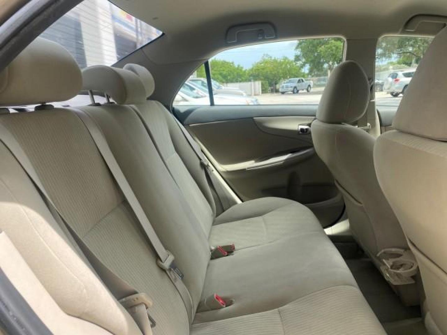 2010 Desert Sand Mica /Bisque Toyota Corolla LE LOW MILES 37,834 (1NXBU4EE1AZ) with an 1.8L DOHC SFI 16-Valve VVT-i 4-Cyl Engine engine, Automatic transmission, located at 4701 North Dixie Hwy, Pompano Beach, FL, 33064, (954) 422-2889, 26.240938, -80.123474 - OUR WEBPAGE FLORIDACARS1.COM HAS OVER 100 PHOTOS AND FREE CARFAX LINK 2010 TOYOTA COROLLA LE 35 mpg VIN: 1NXBU4EE1AZ270742 1 N X B U 4 E E 1 A Z 2 7 0 7 4 2 SEDAN 4 DR 1.8L I4 F DOHC 16V GASOLINE FRONT WHEEL DRIVE Top Features Cloth Seats Satellite Radio Ready Basic Features ABS Brakes AM/FM Stereo - Photo#94