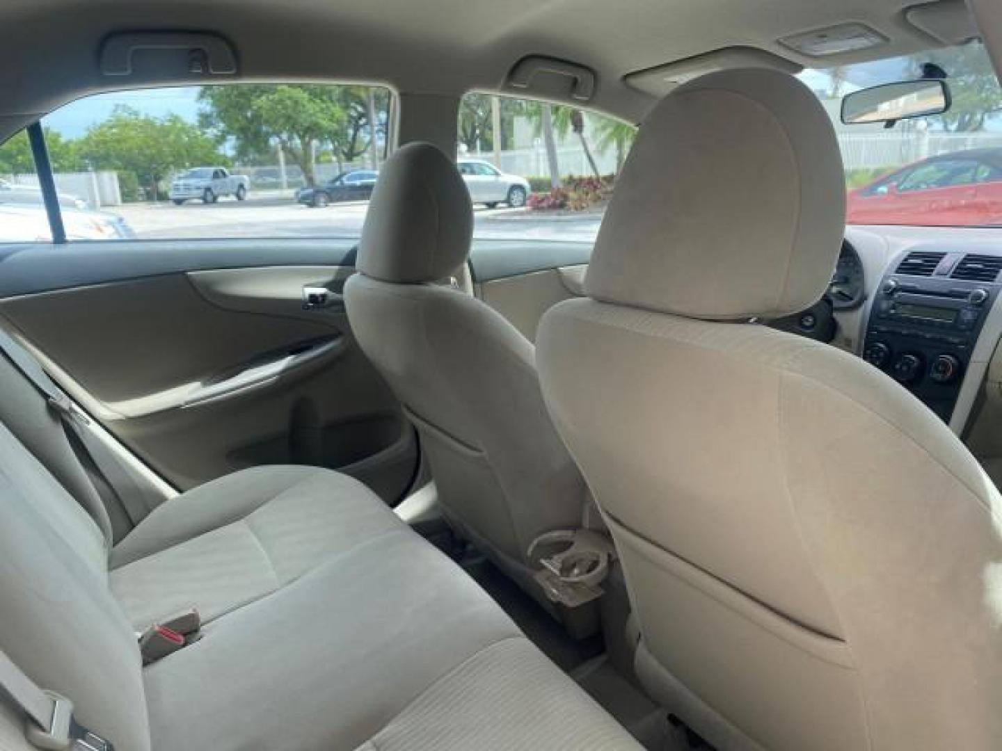 2010 Desert Sand Mica /Bisque Toyota Corolla LE LOW MILES 37,834 (1NXBU4EE1AZ) with an 1.8L DOHC SFI 16-Valve VVT-i 4-Cyl Engine engine, Automatic transmission, located at 4701 North Dixie Hwy, Pompano Beach, FL, 33064, (954) 422-2889, 26.240938, -80.123474 - OUR WEBPAGE FLORIDACARS1.COM HAS OVER 100 PHOTOS AND FREE CARFAX LINK 2010 TOYOTA COROLLA LE 35 mpg VIN: 1NXBU4EE1AZ270742 1 N X B U 4 E E 1 A Z 2 7 0 7 4 2 SEDAN 4 DR 1.8L I4 F DOHC 16V GASOLINE FRONT WHEEL DRIVE Top Features Cloth Seats Satellite Radio Ready Basic Features ABS Brakes AM/FM Stereo - Photo#97