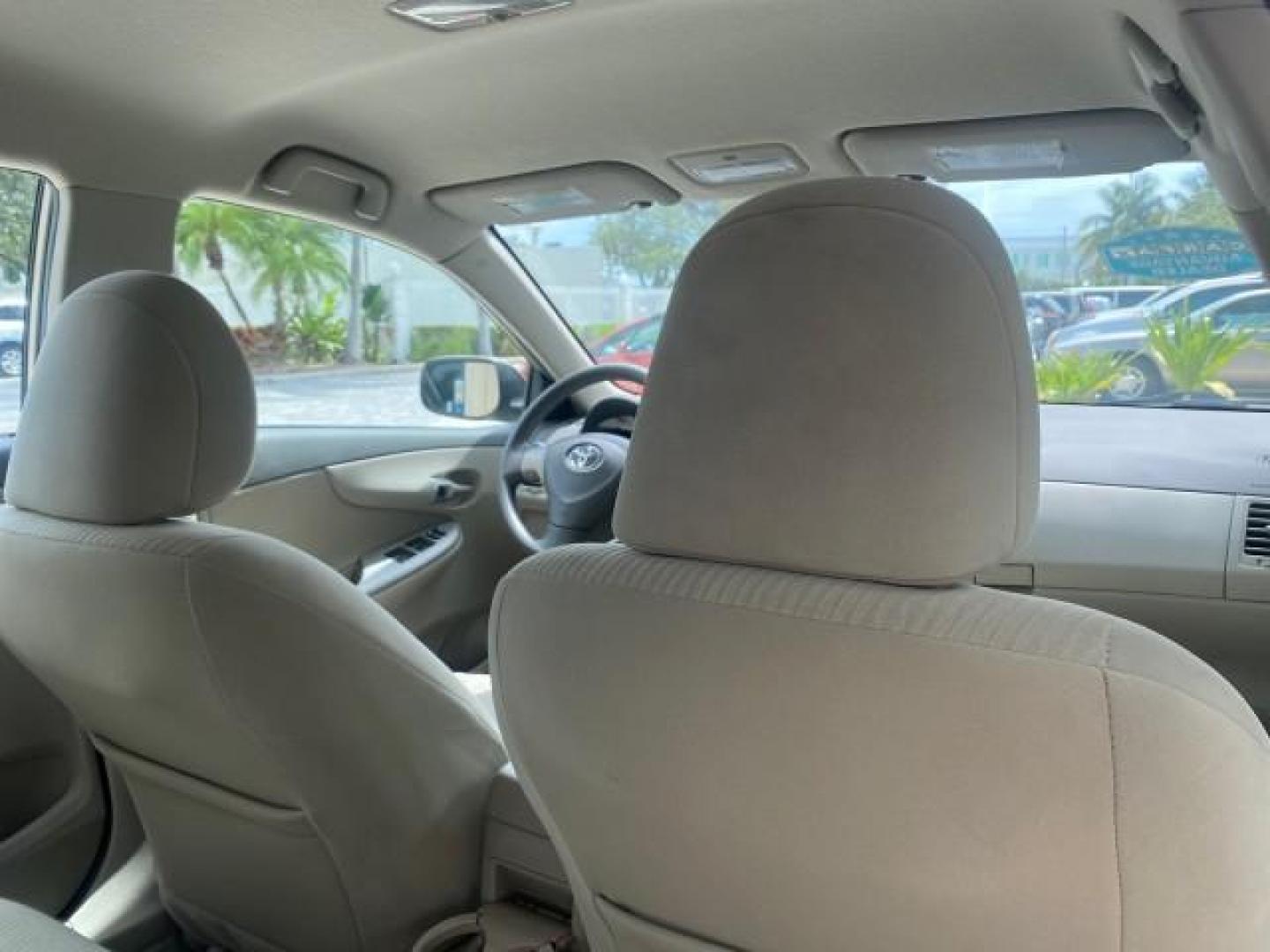 2010 Desert Sand Mica /Bisque Toyota Corolla LE LOW MILES 37,834 (1NXBU4EE1AZ) with an 1.8L DOHC SFI 16-Valve VVT-i 4-Cyl Engine engine, Automatic transmission, located at 4701 North Dixie Hwy, Pompano Beach, FL, 33064, (954) 422-2889, 26.240938, -80.123474 - OUR WEBPAGE FLORIDACARS1.COM HAS OVER 100 PHOTOS AND FREE CARFAX LINK 2010 TOYOTA COROLLA LE 35 mpg VIN: 1NXBU4EE1AZ270742 1 N X B U 4 E E 1 A Z 2 7 0 7 4 2 SEDAN 4 DR 1.8L I4 F DOHC 16V GASOLINE FRONT WHEEL DRIVE Top Features Cloth Seats Satellite Radio Ready Basic Features ABS Brakes AM/FM Stereo - Photo#98