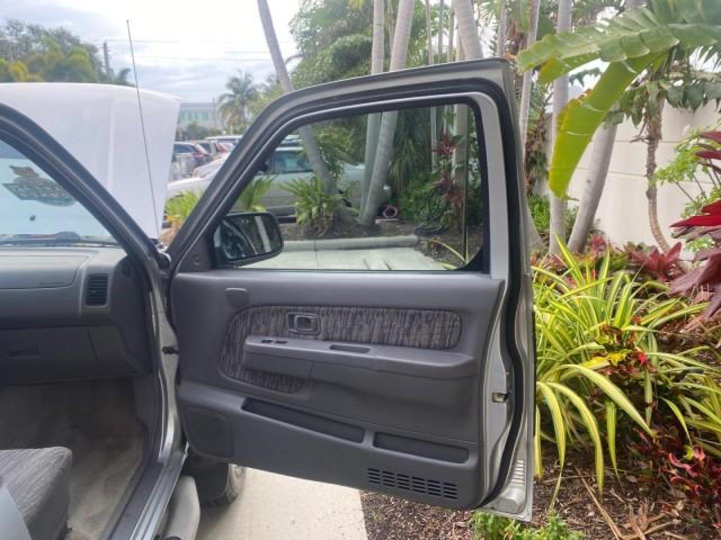 2000 Silver Ice Metallic /Gray Nissan Frontier 2WD SE 1 OWNER V6 AC NICE (1N6ED26T0YC) with an 3.3L SOHC SMPI V6 Engine engine, Automatic transmission, located at 4701 North Dixie Hwy, Pompano Beach, FL, 33064, (954) 422-2889, 26.240938, -80.123474 - OUR WEBPAGE FLORIDACARS1.COM HAS OVER 100 PHOTOS AND FREE CARFAX LINK 2000 NISSAN FRONTIER XE DESERT RUNNER VIN: 1N6ED26T0YC315234 1 N 6 E D 2 6 T 0 Y C 3 1 5 2 3 4 CLUB CAB PICKUP 3.3L V6 F SOHC 12V GASOLINE REAR WHEEL DRIVE Top Features Alloy Wheels Cloth Seats Running Boards Sport Package Sunroof - Photo#11