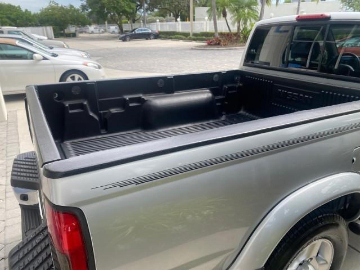 2000 Silver Ice Metallic /Gray Nissan Frontier 2WD SE 1 OWNER V6 AC NICE (1N6ED26T0YC) with an 3.3L SOHC SMPI V6 Engine engine, Automatic transmission, located at 4701 North Dixie Hwy, Pompano Beach, FL, 33064, (954) 422-2889, 26.240938, -80.123474 - OUR WEBPAGE FLORIDACARS1.COM HAS OVER 100 PHOTOS AND FREE CARFAX LINK 2000 NISSAN FRONTIER XE DESERT RUNNER VIN: 1N6ED26T0YC315234 1 N 6 E D 2 6 T 0 Y C 3 1 5 2 3 4 CLUB CAB PICKUP 3.3L V6 F SOHC 12V GASOLINE REAR WHEEL DRIVE Top Features Alloy Wheels Cloth Seats Running Boards Sport Package Sunroof - Photo#95