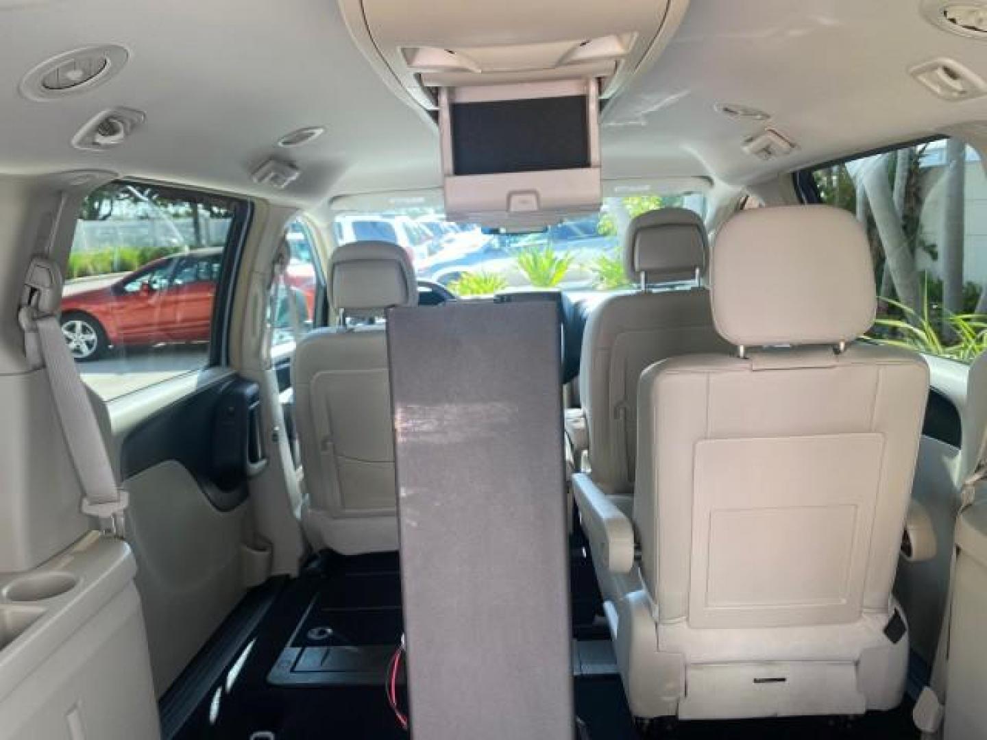 2012 Crystal Blue Pearl /Black/Light Graystone Interior Chrysler Town and Country HANDICAP LIFT LOW MILES 32,124 (2C4RC1BG6CR) with an 3.6L V6 Cylinder Engine engine, Automatic transmission, located at 4701 North Dixie Hwy, Pompano Beach, FL, 33064, (954) 422-2889, 26.240938, -80.123474 - OUR WEBPAGE FLORIDACARS1.COM HAS OVER 100 PHOTOS AND FREE CARFAX LINK 2012 CHRYSLER TOWN AND COUNTRY TOURING HANDICAP LIFT WORKS GREAT ! VIN: 2C4RC1BG6CR301509 2 C 4 R C 1 B G 6 C R 3 0 1 5 0 9 VAN 3.6L V6 F DOHC 24V GASOLINE FRONT WHEEL DRIVE Top Features Alloy Wheels Bluetooth Technology Fold-Away - Photo#89