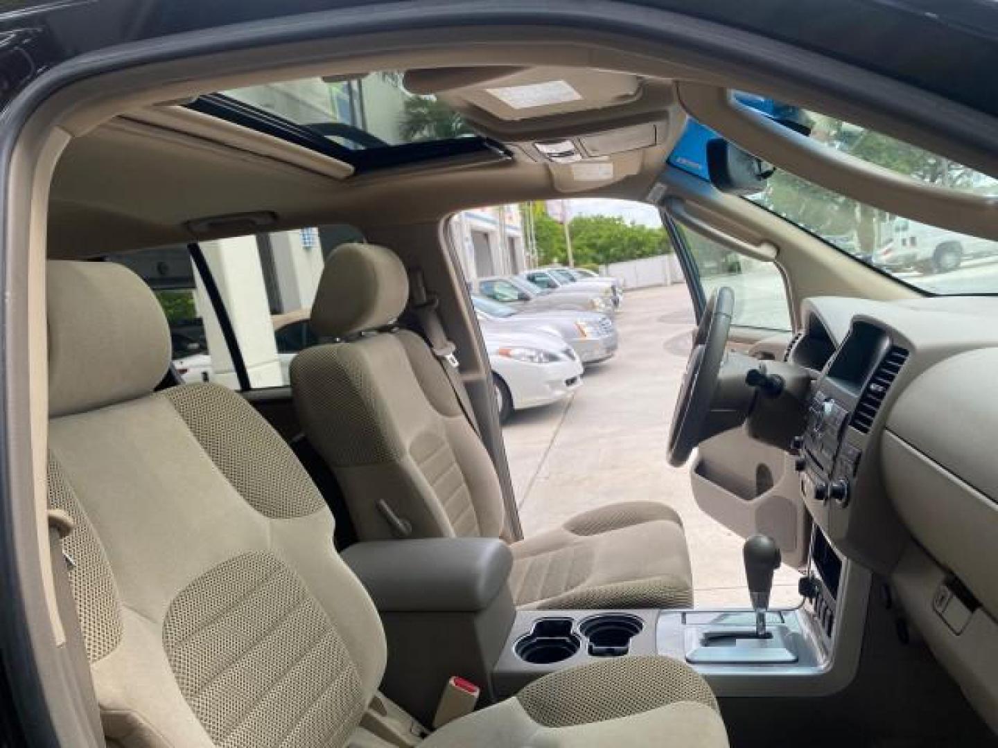 2008 Super Black Metallic /Cafe Latte Nissan Pathfinder 4X4 SE 1 OWNER LOW MILES 52,889 (5N1AR18B58C) with an 4.0L DOHC 24-Valve V6 Engine engine, Automatic transmission, located at 4701 North Dixie Hwy, Pompano Beach, FL, 33064, (954) 422-2889, 26.240938, -80.123474 - OUR WEBPAGE FLORIDACARS1.COM HAS OVER 100 PHOTOS AND FREE CARFAX LINK 2008 NISSAN PATHFINDER S VIN: 5N1AR18B58C629944 5 N 1 A R 1 8 B 5 8 C 6 2 9 9 4 4 4 DOOR WAGON/SPORT UTILITY 4.0L V6 F DOHC 24V GASOLINE ALL WHEEL DRIVE Top Features 4WD/AWD Alloy Wheels BOSE Sound System Cloth Seats Fold-Away Thi - Photo#12