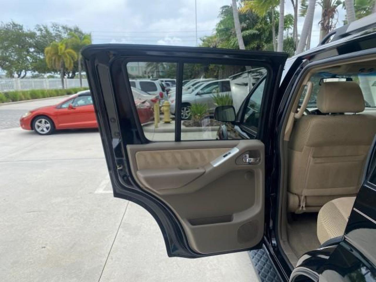 2008 Super Black Metallic /Cafe Latte Nissan Pathfinder 4X4 SE 1 OWNER LOW MILES 52,889 (5N1AR18B58C) with an 4.0L DOHC 24-Valve V6 Engine engine, Automatic transmission, located at 4701 North Dixie Hwy, Pompano Beach, FL, 33064, (954) 422-2889, 26.240938, -80.123474 - OUR WEBPAGE FLORIDACARS1.COM HAS OVER 100 PHOTOS AND FREE CARFAX LINK 2008 NISSAN PATHFINDER S VIN: 5N1AR18B58C629944 5 N 1 A R 1 8 B 5 8 C 6 2 9 9 4 4 4 DOOR WAGON/SPORT UTILITY 4.0L V6 F DOHC 24V GASOLINE ALL WHEEL DRIVE Top Features 4WD/AWD Alloy Wheels BOSE Sound System Cloth Seats Fold-Away Thi - Photo#13