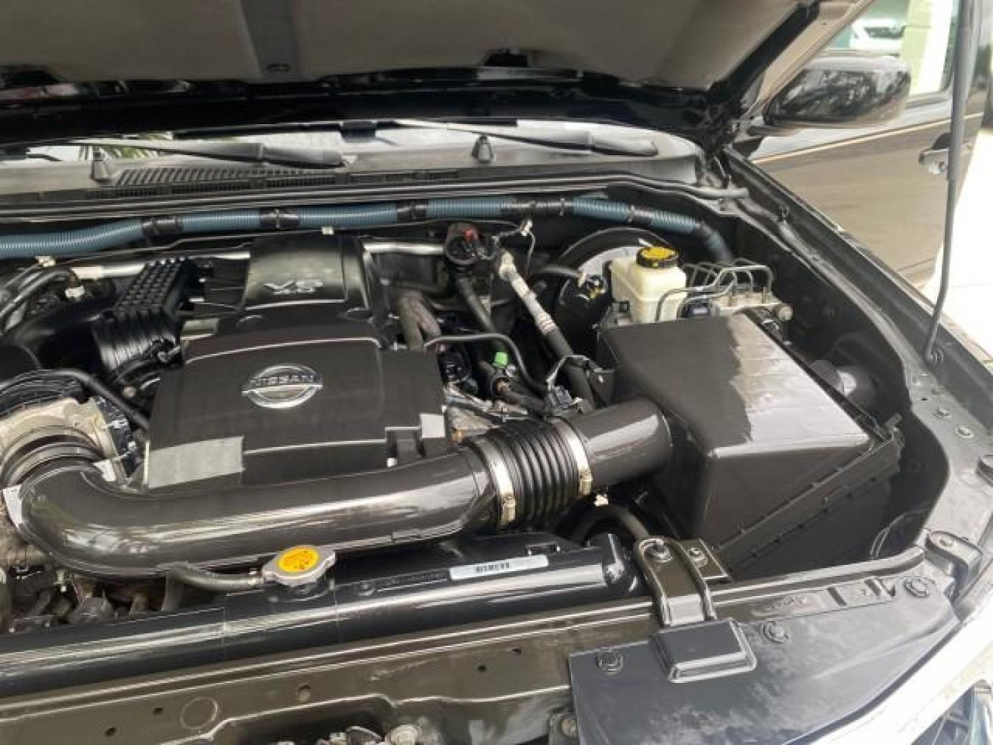 2008 Super Black Metallic /Cafe Latte Nissan Pathfinder 4X4 SE 1 OWNER LOW MILES 52,889 (5N1AR18B58C) with an 4.0L DOHC 24-Valve V6 Engine engine, Automatic transmission, located at 4701 North Dixie Hwy, Pompano Beach, FL, 33064, (954) 422-2889, 26.240938, -80.123474 - OUR WEBPAGE FLORIDACARS1.COM HAS OVER 100 PHOTOS AND FREE CARFAX LINK 2008 NISSAN PATHFINDER S VIN: 5N1AR18B58C629944 5 N 1 A R 1 8 B 5 8 C 6 2 9 9 4 4 4 DOOR WAGON/SPORT UTILITY 4.0L V6 F DOHC 24V GASOLINE ALL WHEEL DRIVE Top Features 4WD/AWD Alloy Wheels BOSE Sound System Cloth Seats Fold-Away Thi - Photo#26
