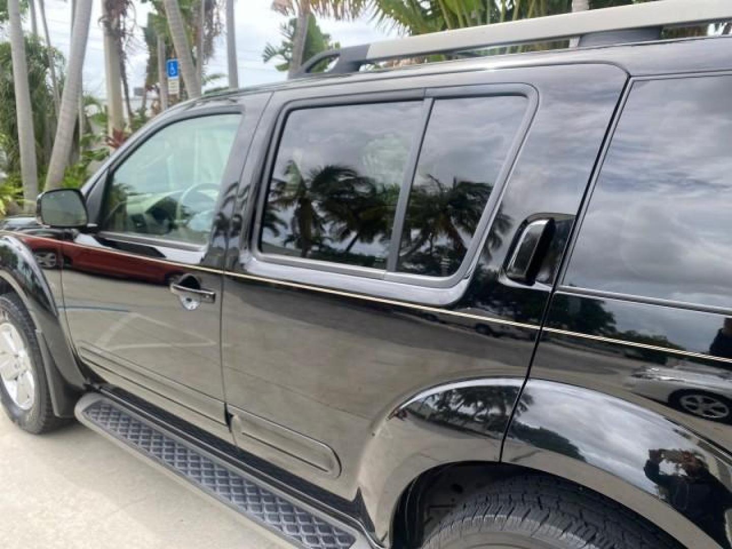 2008 Super Black Metallic /Cafe Latte Nissan Pathfinder 4X4 SE 1 OWNER LOW MILES 52,889 (5N1AR18B58C) with an 4.0L DOHC 24-Valve V6 Engine engine, Automatic transmission, located at 4701 North Dixie Hwy, Pompano Beach, FL, 33064, (954) 422-2889, 26.240938, -80.123474 - OUR WEBPAGE FLORIDACARS1.COM HAS OVER 100 PHOTOS AND FREE CARFAX LINK 2008 NISSAN PATHFINDER S VIN: 5N1AR18B58C629944 5 N 1 A R 1 8 B 5 8 C 6 2 9 9 4 4 4 DOOR WAGON/SPORT UTILITY 4.0L V6 F DOHC 24V GASOLINE ALL WHEEL DRIVE Top Features 4WD/AWD Alloy Wheels BOSE Sound System Cloth Seats Fold-Away Thi - Photo#64