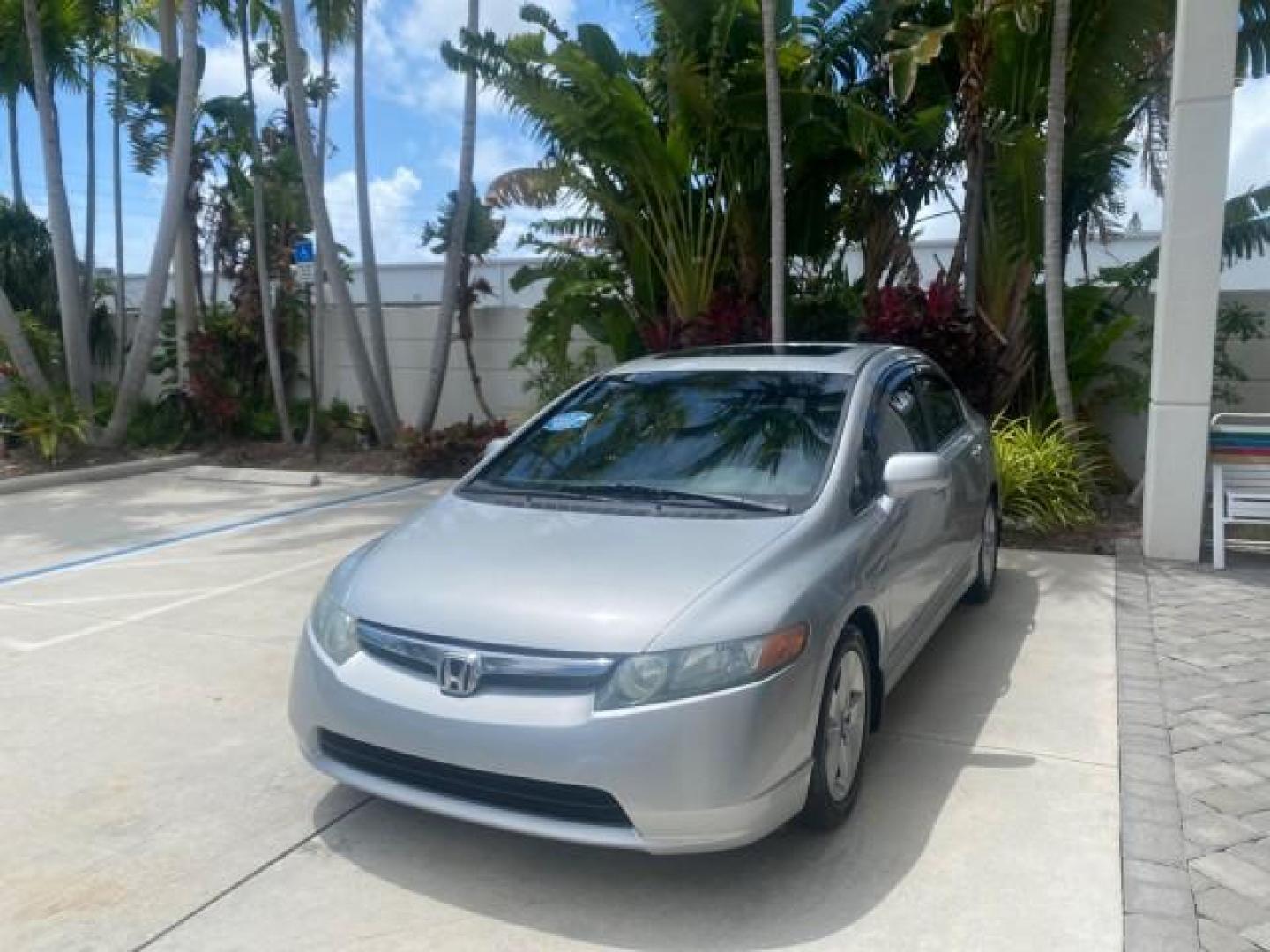 2008 Galaxy Gray Metallic /Gray Honda Civic Sdn 5 SPD EX LOW MILES 45,323 (1HGFA15818L) with an 1.8L SOHC MPFI 16-Valve i-VTEC I4 Engine engine, Manual transmission, located at 4701 North Dixie Hwy, Pompano Beach, FL, 33064, (954) 422-2889, 26.240938, -80.123474 - OUR WEBPAGE FLORIDACARS1.COM HAS OVER 100 PHOTOS AND FREE CARFAX LINK 2008 HONDA CIVIC EX VIN: 1HGFA15818L077404 1 H G F A 1 5 8 1 8 L 0 7 7 4 0 4 SEDAN 4 DR 1.8L I4 F SOHC 16V GASOLINE FRONT WHEEL DRIVE Top Features Alloy Wheels Cloth Seats Sunroof(s) Basic Features ABS Brakes AM/FM Stereo Air Cond - Photo#3