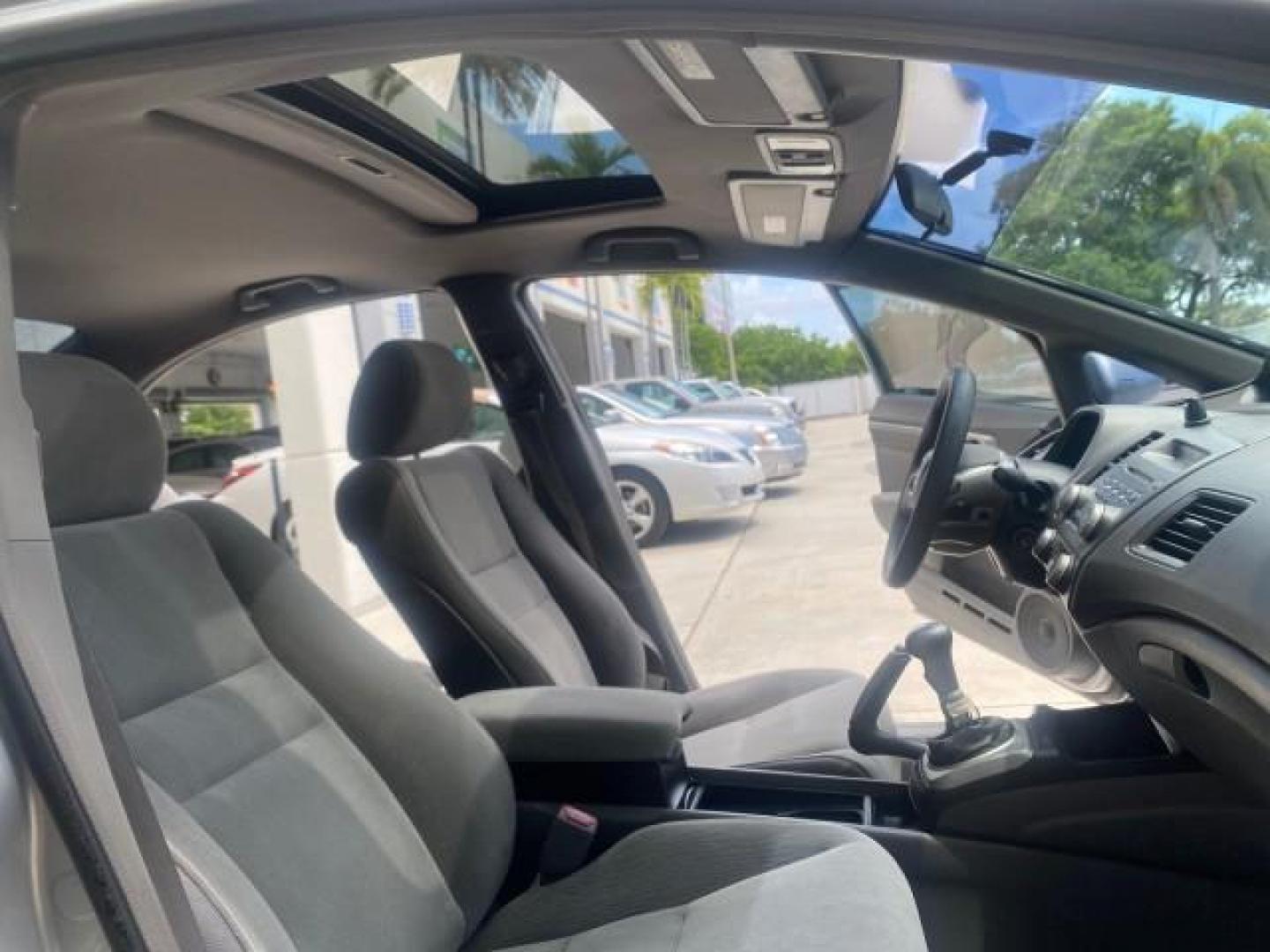 2008 Galaxy Gray Metallic /Gray Honda Civic Sdn 5 SPD EX LOW MILES 45,323 (1HGFA15818L) with an 1.8L SOHC MPFI 16-Valve i-VTEC I4 Engine engine, Manual transmission, located at 4701 North Dixie Hwy, Pompano Beach, FL, 33064, (954) 422-2889, 26.240938, -80.123474 - OUR WEBPAGE FLORIDACARS1.COM HAS OVER 100 PHOTOS AND FREE CARFAX LINK 2008 HONDA CIVIC EX VIN: 1HGFA15818L077404 1 H G F A 1 5 8 1 8 L 0 7 7 4 0 4 SEDAN 4 DR 1.8L I4 F SOHC 16V GASOLINE FRONT WHEEL DRIVE Top Features Alloy Wheels Cloth Seats Sunroof(s) Basic Features ABS Brakes AM/FM Stereo Air Cond - Photo#12