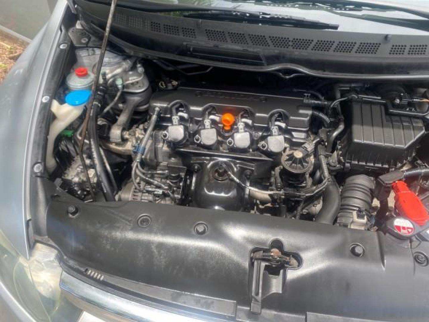 2008 Galaxy Gray Metallic /Gray Honda Civic Sdn 5 SPD EX LOW MILES 45,323 (1HGFA15818L) with an 1.8L SOHC MPFI 16-Valve i-VTEC I4 Engine engine, Manual transmission, located at 4701 North Dixie Hwy, Pompano Beach, FL, 33064, (954) 422-2889, 26.240938, -80.123474 - OUR WEBPAGE FLORIDACARS1.COM HAS OVER 100 PHOTOS AND FREE CARFAX LINK 2008 HONDA CIVIC EX VIN: 1HGFA15818L077404 1 H G F A 1 5 8 1 8 L 0 7 7 4 0 4 SEDAN 4 DR 1.8L I4 F SOHC 16V GASOLINE FRONT WHEEL DRIVE Top Features Alloy Wheels Cloth Seats Sunroof(s) Basic Features ABS Brakes AM/FM Stereo Air Cond - Photo#25