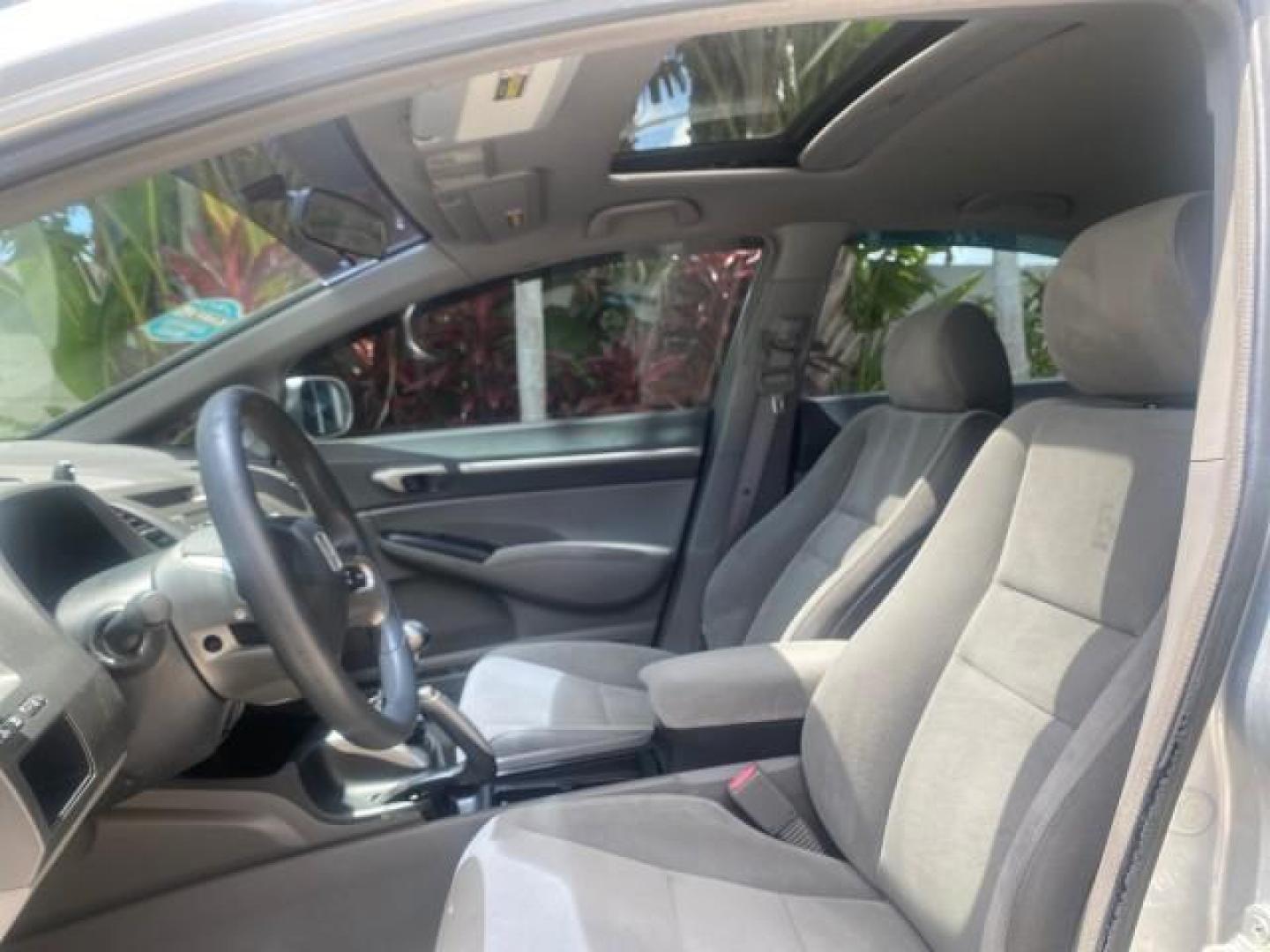 2008 Galaxy Gray Metallic /Gray Honda Civic Sdn 5 SPD EX LOW MILES 45,323 (1HGFA15818L) with an 1.8L SOHC MPFI 16-Valve i-VTEC I4 Engine engine, Manual transmission, located at 4701 North Dixie Hwy, Pompano Beach, FL, 33064, (954) 422-2889, 26.240938, -80.123474 - OUR WEBPAGE FLORIDACARS1.COM HAS OVER 100 PHOTOS AND FREE CARFAX LINK 2008 HONDA CIVIC EX VIN: 1HGFA15818L077404 1 H G F A 1 5 8 1 8 L 0 7 7 4 0 4 SEDAN 4 DR 1.8L I4 F SOHC 16V GASOLINE FRONT WHEEL DRIVE Top Features Alloy Wheels Cloth Seats Sunroof(s) Basic Features ABS Brakes AM/FM Stereo Air Cond - Photo#33