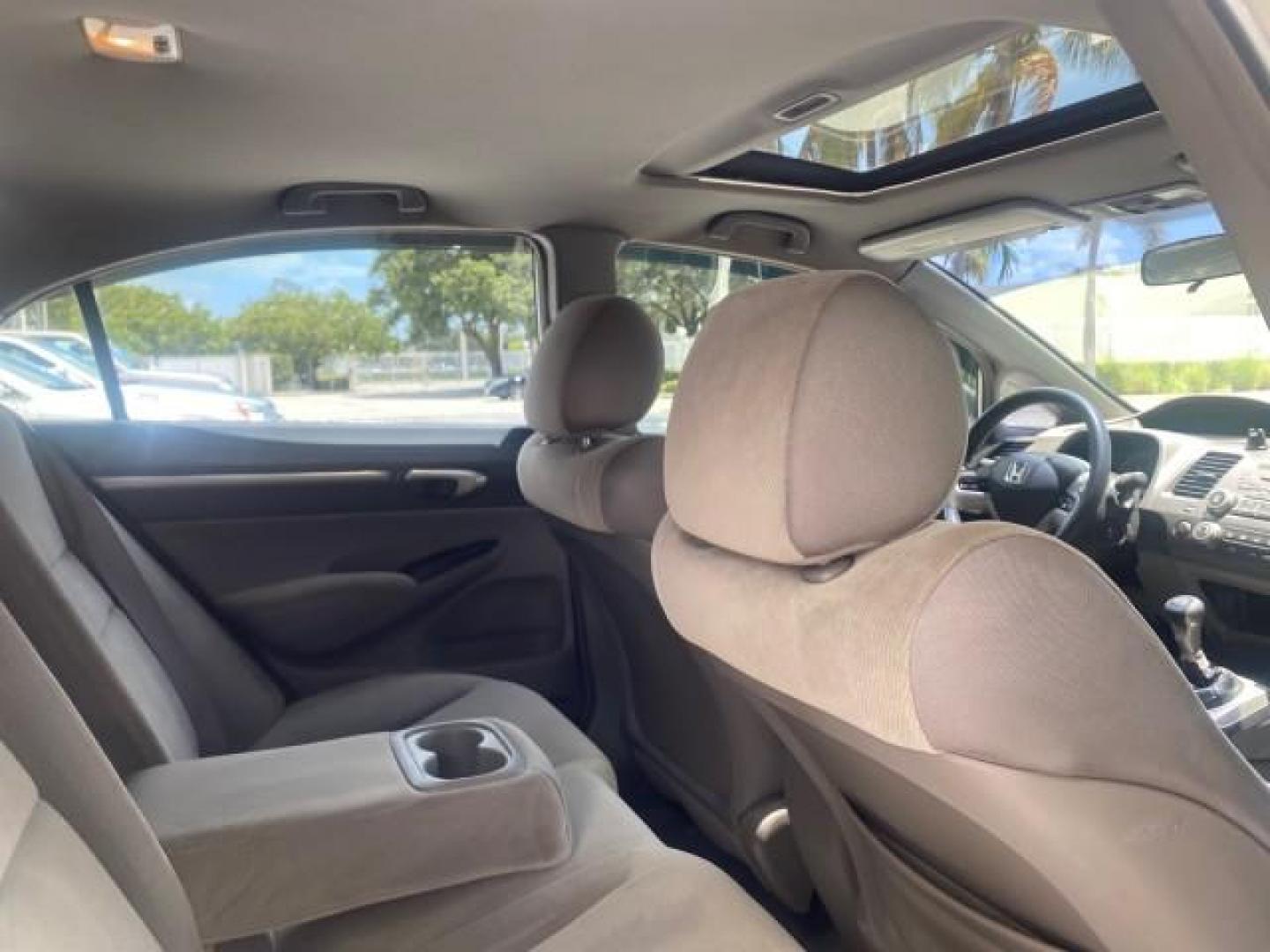 2008 Galaxy Gray Metallic /Gray Honda Civic Sdn 5 SPD EX LOW MILES 45,323 (1HGFA15818L) with an 1.8L SOHC MPFI 16-Valve i-VTEC I4 Engine engine, Manual transmission, located at 4701 North Dixie Hwy, Pompano Beach, FL, 33064, (954) 422-2889, 26.240938, -80.123474 - OUR WEBPAGE FLORIDACARS1.COM HAS OVER 100 PHOTOS AND FREE CARFAX LINK 2008 HONDA CIVIC EX VIN: 1HGFA15818L077404 1 H G F A 1 5 8 1 8 L 0 7 7 4 0 4 SEDAN 4 DR 1.8L I4 F SOHC 16V GASOLINE FRONT WHEEL DRIVE Top Features Alloy Wheels Cloth Seats Sunroof(s) Basic Features ABS Brakes AM/FM Stereo Air Cond - Photo#95