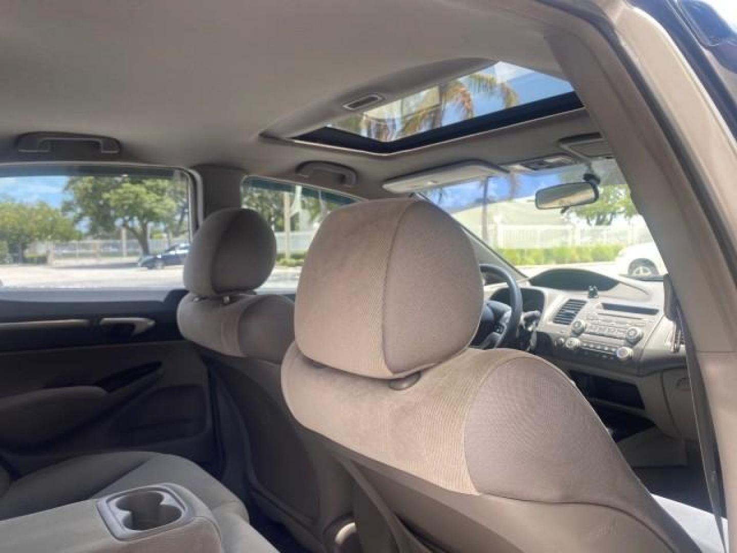 2008 Galaxy Gray Metallic /Gray Honda Civic Sdn 5 SPD EX LOW MILES 45,323 (1HGFA15818L) with an 1.8L SOHC MPFI 16-Valve i-VTEC I4 Engine engine, Manual transmission, located at 4701 North Dixie Hwy, Pompano Beach, FL, 33064, (954) 422-2889, 26.240938, -80.123474 - OUR WEBPAGE FLORIDACARS1.COM HAS OVER 100 PHOTOS AND FREE CARFAX LINK 2008 HONDA CIVIC EX VIN: 1HGFA15818L077404 1 H G F A 1 5 8 1 8 L 0 7 7 4 0 4 SEDAN 4 DR 1.8L I4 F SOHC 16V GASOLINE FRONT WHEEL DRIVE Top Features Alloy Wheels Cloth Seats Sunroof(s) Basic Features ABS Brakes AM/FM Stereo Air Cond - Photo#96