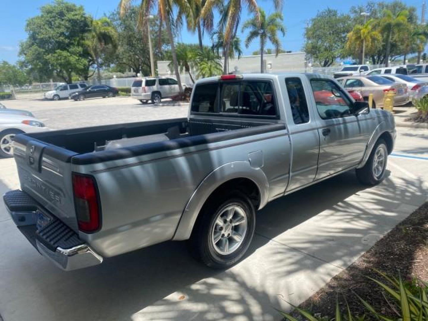 2002 Just Blue Metallic /Gray Nissan Frontier 2WD XE XCAB 5 SPD AC 4 CYL (1N6DD26S42C) with an 2.4L DOHC SMPI 16-Valve 4-Cyl Engine engine, Manual transmission, located at 4701 North Dixie Hwy, Pompano Beach, FL, 33064, (954) 422-2889, 26.240938, -80.123474 - OUR WEBPAGE FLORIDACARS1.COM HAS OVER 100 PHOTOS AND FREE CARFAX LINK 2002 NISSAN FRONTIER XE 4 CYL 5 SPD VIN: 1N6DD26S42C374720 1 N 6 D D 2 6 S 4 2 C 3 7 4 7 2 0 CLUB CAB PICKUP 2.4L I4 F DOHC 16V GASOLINE REAR WHEEL DRIVE Top Features Alloy Wheels Bed Liner Cloth Seats Tow Hitch Basic Features ABS - Photo#7