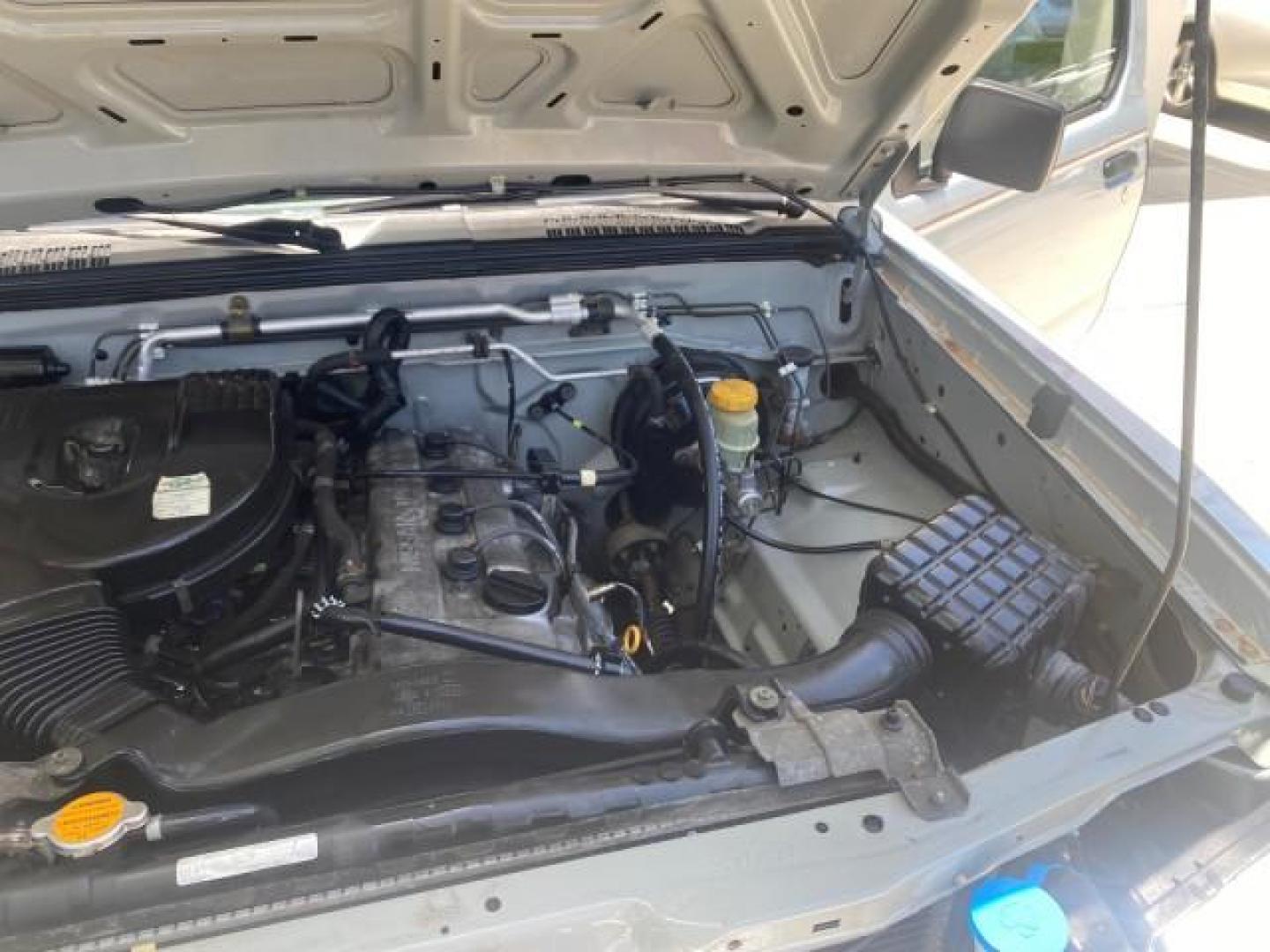 2002 Just Blue Metallic /Gray Nissan Frontier 2WD XE XCAB 5 SPD AC 4 CYL (1N6DD26S42C) with an 2.4L DOHC SMPI 16-Valve 4-Cyl Engine engine, Manual transmission, located at 4701 North Dixie Hwy, Pompano Beach, FL, 33064, (954) 422-2889, 26.240938, -80.123474 - OUR WEBPAGE FLORIDACARS1.COM HAS OVER 100 PHOTOS AND FREE CARFAX LINK 2002 NISSAN FRONTIER XE 4 CYL 5 SPD VIN: 1N6DD26S42C374720 1 N 6 D D 2 6 S 4 2 C 3 7 4 7 2 0 CLUB CAB PICKUP 2.4L I4 F DOHC 16V GASOLINE REAR WHEEL DRIVE Top Features Alloy Wheels Bed Liner Cloth Seats Tow Hitch Basic Features ABS - Photo#25