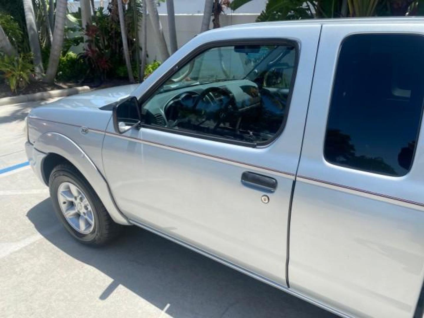 2002 Just Blue Metallic /Gray Nissan Frontier 2WD XE XCAB 5 SPD AC 4 CYL (1N6DD26S42C) with an 2.4L DOHC SMPI 16-Valve 4-Cyl Engine engine, Manual transmission, located at 4701 North Dixie Hwy, Pompano Beach, FL, 33064, (954) 422-2889, 26.240938, -80.123474 - OUR WEBPAGE FLORIDACARS1.COM HAS OVER 100 PHOTOS AND FREE CARFAX LINK 2002 NISSAN FRONTIER XE 4 CYL 5 SPD VIN: 1N6DD26S42C374720 1 N 6 D D 2 6 S 4 2 C 3 7 4 7 2 0 CLUB CAB PICKUP 2.4L I4 F DOHC 16V GASOLINE REAR WHEEL DRIVE Top Features Alloy Wheels Bed Liner Cloth Seats Tow Hitch Basic Features ABS - Photo#26