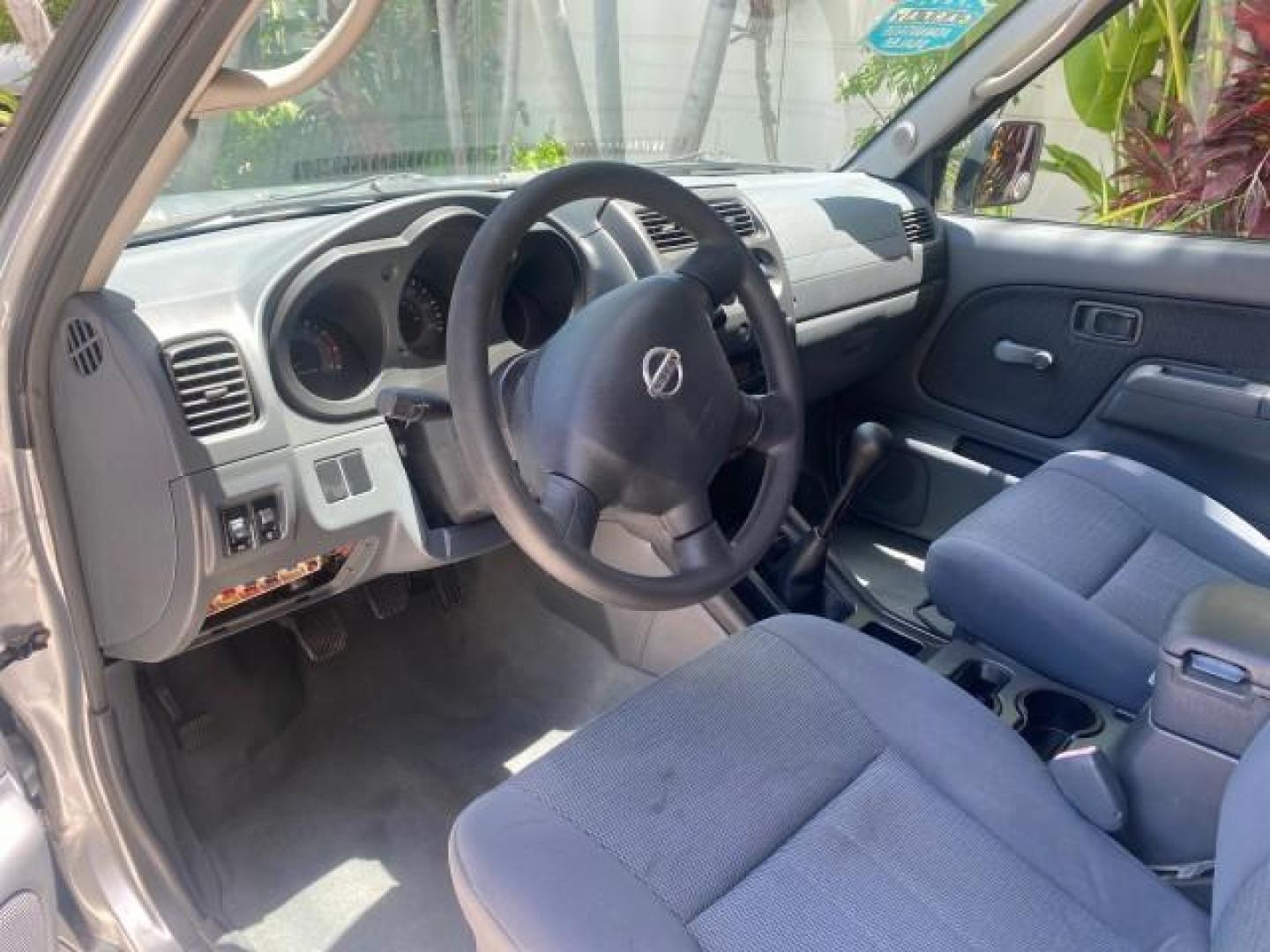2002 Just Blue Metallic /Gray Nissan Frontier 2WD XE XCAB 5 SPD AC 4 CYL (1N6DD26S42C) with an 2.4L DOHC SMPI 16-Valve 4-Cyl Engine engine, Manual transmission, located at 4701 North Dixie Hwy, Pompano Beach, FL, 33064, (954) 422-2889, 26.240938, -80.123474 - OUR WEBPAGE FLORIDACARS1.COM HAS OVER 100 PHOTOS AND FREE CARFAX LINK 2002 NISSAN FRONTIER XE 4 CYL 5 SPD VIN: 1N6DD26S42C374720 1 N 6 D D 2 6 S 4 2 C 3 7 4 7 2 0 CLUB CAB PICKUP 2.4L I4 F DOHC 16V GASOLINE REAR WHEEL DRIVE Top Features Alloy Wheels Bed Liner Cloth Seats Tow Hitch Basic Features ABS - Photo#36