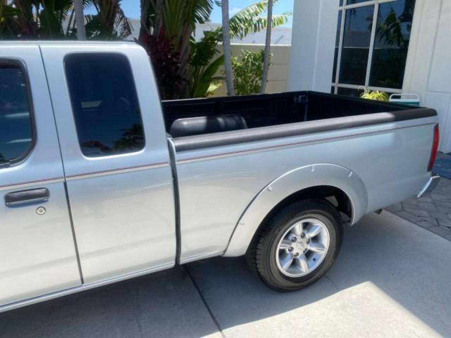 2002 Just Blue Metallic /Gray Nissan Frontier 2WD XE XCAB 5 SPD AC 4 CYL (1N6DD26S42C) with an 2.4L DOHC SMPI 16-Valve 4-Cyl Engine engine, Manual transmission, located at 4701 North Dixie Hwy, Pompano Beach, FL, 33064, (954) 422-2889, 26.240938, -80.123474 - OUR WEBPAGE FLORIDACARS1.COM HAS OVER 100 PHOTOS AND FREE CARFAX LINK 2002 NISSAN FRONTIER XE 4 CYL 5 SPD VIN: 1N6DD26S42C374720 1 N 6 D D 2 6 S 4 2 C 3 7 4 7 2 0 CLUB CAB PICKUP 2.4L I4 F DOHC 16V GASOLINE REAR WHEEL DRIVE Top Features Alloy Wheels Bed Liner Cloth Seats Tow Hitch Basic Features ABS - Photo#59