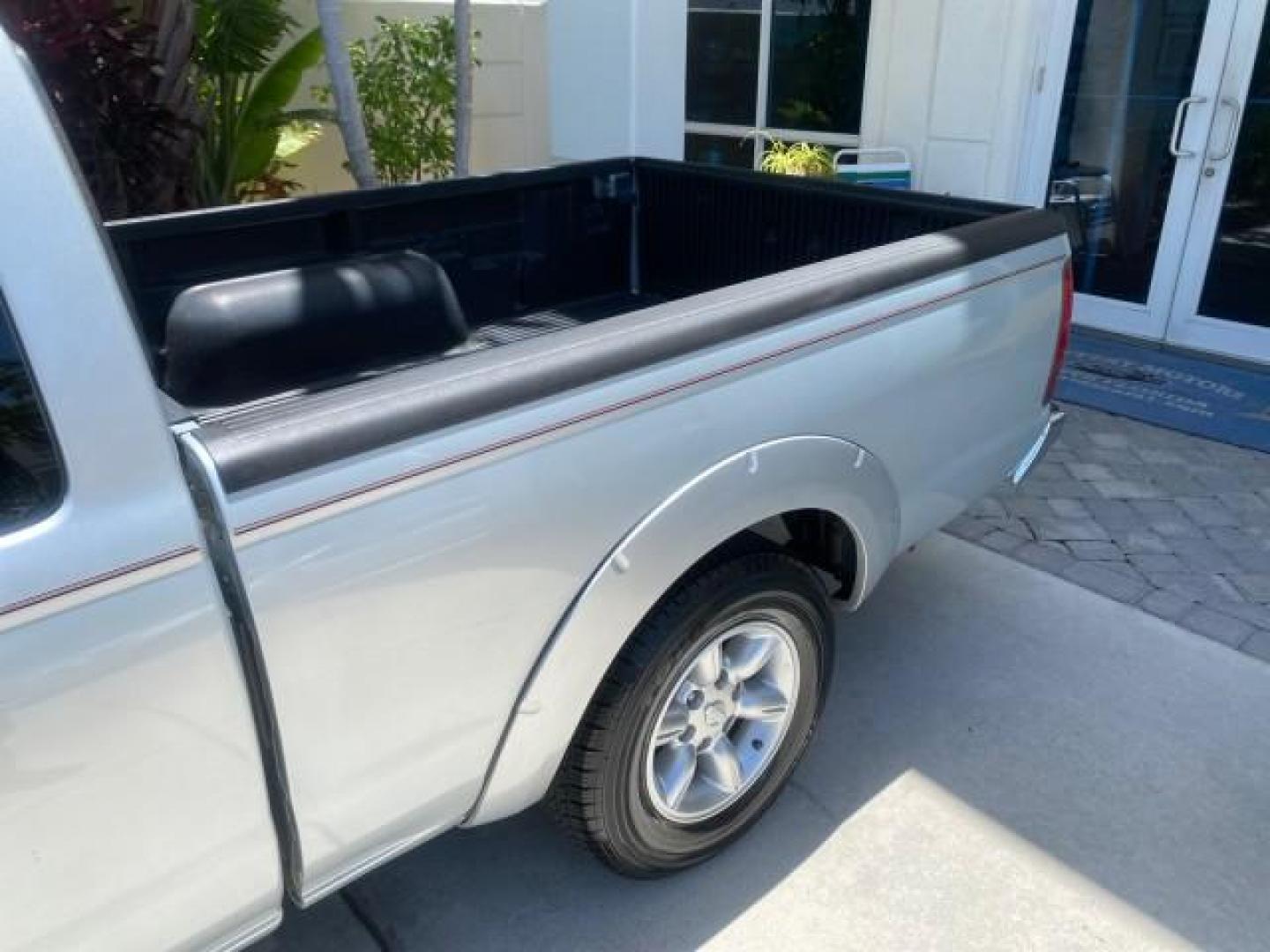 2002 Just Blue Metallic /Gray Nissan Frontier 2WD XE XCAB 5 SPD AC 4 CYL (1N6DD26S42C) with an 2.4L DOHC SMPI 16-Valve 4-Cyl Engine engine, Manual transmission, located at 4701 North Dixie Hwy, Pompano Beach, FL, 33064, (954) 422-2889, 26.240938, -80.123474 - OUR WEBPAGE FLORIDACARS1.COM HAS OVER 100 PHOTOS AND FREE CARFAX LINK 2002 NISSAN FRONTIER XE 4 CYL 5 SPD VIN: 1N6DD26S42C374720 1 N 6 D D 2 6 S 4 2 C 3 7 4 7 2 0 CLUB CAB PICKUP 2.4L I4 F DOHC 16V GASOLINE REAR WHEEL DRIVE Top Features Alloy Wheels Bed Liner Cloth Seats Tow Hitch Basic Features ABS - Photo#62