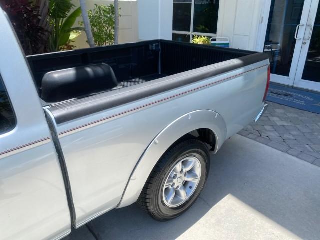 2002 Silver Ice Metallic /Gray Nissan Frontier 2WD XE XCAB 5 SPD AC 4 CYL (1N6DD26S42C) with an 2.4L DOHC SMPI 16-Valve 4-Cyl Engine engine, Manual transmission, located at 4701 North Dixie Hwy, Pompano Beach, FL, 33064, (954) 422-2889, 26.240938, -80.123474 - OUR WEBPAGE FLORIDACARS1.COM HAS OVER 100 PHOTOS AND FREE CARFAX LINK 2002 NISSAN FRONTIER XE 4 CYL 5 SPD VIN: 1N6DD26S42C374720 1 N 6 D D 2 6 S 4 2 C 3 7 4 7 2 0 CLUB CAB PICKUP 2.4L I4 F DOHC 16V GASOLINE REAR WHEEL DRIVE Top Features Alloy Wheels Bed Liner Cloth Seats Tow Hitch Basic Features ABS - Photo#62