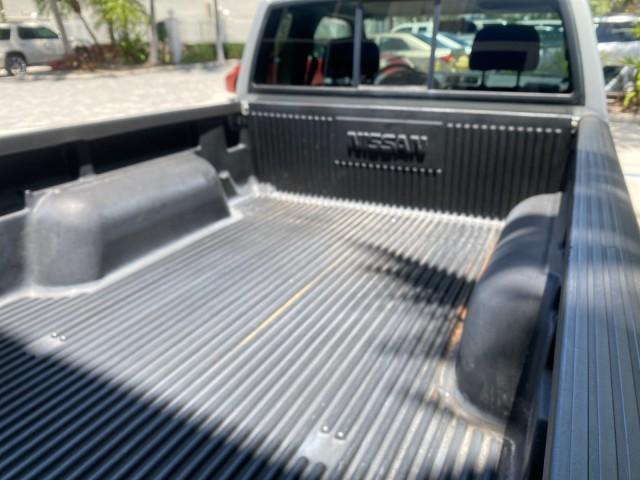 2002 Silver Ice Metallic /Gray Nissan Frontier 2WD XE XCAB 5 SPD AC 4 CYL (1N6DD26S42C) with an 2.4L DOHC SMPI 16-Valve 4-Cyl Engine engine, Manual transmission, located at 4701 North Dixie Hwy, Pompano Beach, FL, 33064, (954) 422-2889, 26.240938, -80.123474 - OUR WEBPAGE FLORIDACARS1.COM HAS OVER 100 PHOTOS AND FREE CARFAX LINK 2002 NISSAN FRONTIER XE 4 CYL 5 SPD VIN: 1N6DD26S42C374720 1 N 6 D D 2 6 S 4 2 C 3 7 4 7 2 0 CLUB CAB PICKUP 2.4L I4 F DOHC 16V GASOLINE REAR WHEEL DRIVE Top Features Alloy Wheels Bed Liner Cloth Seats Tow Hitch Basic Features ABS - Photo#76