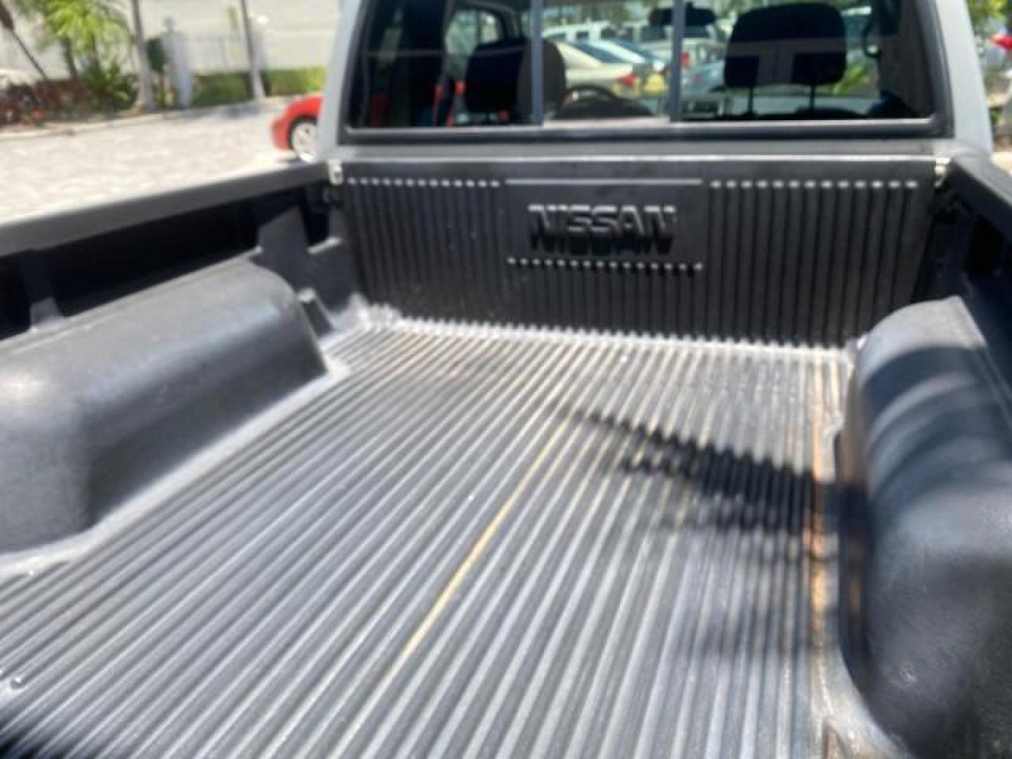 2002 Just Blue Metallic /Gray Nissan Frontier 2WD XE XCAB 5 SPD AC 4 CYL (1N6DD26S42C) with an 2.4L DOHC SMPI 16-Valve 4-Cyl Engine engine, Manual transmission, located at 4701 North Dixie Hwy, Pompano Beach, FL, 33064, (954) 422-2889, 26.240938, -80.123474 - OUR WEBPAGE FLORIDACARS1.COM HAS OVER 100 PHOTOS AND FREE CARFAX LINK 2002 NISSAN FRONTIER XE 4 CYL 5 SPD VIN: 1N6DD26S42C374720 1 N 6 D D 2 6 S 4 2 C 3 7 4 7 2 0 CLUB CAB PICKUP 2.4L I4 F DOHC 16V GASOLINE REAR WHEEL DRIVE Top Features Alloy Wheels Bed Liner Cloth Seats Tow Hitch Basic Features ABS - Photo#78