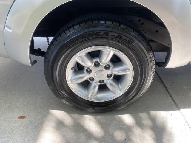 2002 Silver Ice Metallic /Gray Nissan Frontier 2WD XE XCAB 5 SPD AC 4 CYL (1N6DD26S42C) with an 2.4L DOHC SMPI 16-Valve 4-Cyl Engine engine, Manual transmission, located at 4701 North Dixie Hwy, Pompano Beach, FL, 33064, (954) 422-2889, 26.240938, -80.123474 - OUR WEBPAGE FLORIDACARS1.COM HAS OVER 100 PHOTOS AND FREE CARFAX LINK 2002 NISSAN FRONTIER XE 4 CYL 5 SPD VIN: 1N6DD26S42C374720 1 N 6 D D 2 6 S 4 2 C 3 7 4 7 2 0 CLUB CAB PICKUP 2.4L I4 F DOHC 16V GASOLINE REAR WHEEL DRIVE Top Features Alloy Wheels Bed Liner Cloth Seats Tow Hitch Basic Features ABS - Photo#80