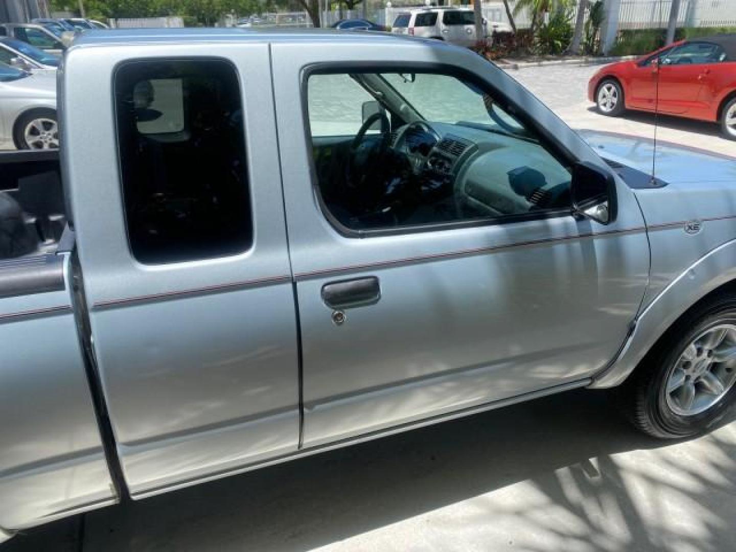 2002 Just Blue Metallic /Gray Nissan Frontier 2WD XE XCAB 5 SPD AC 4 CYL (1N6DD26S42C) with an 2.4L DOHC SMPI 16-Valve 4-Cyl Engine engine, Manual transmission, located at 4701 North Dixie Hwy, Pompano Beach, FL, 33064, (954) 422-2889, 26.240938, -80.123474 - OUR WEBPAGE FLORIDACARS1.COM HAS OVER 100 PHOTOS AND FREE CARFAX LINK 2002 NISSAN FRONTIER XE 4 CYL 5 SPD VIN: 1N6DD26S42C374720 1 N 6 D D 2 6 S 4 2 C 3 7 4 7 2 0 CLUB CAB PICKUP 2.4L I4 F DOHC 16V GASOLINE REAR WHEEL DRIVE Top Features Alloy Wheels Bed Liner Cloth Seats Tow Hitch Basic Features ABS - Photo#88