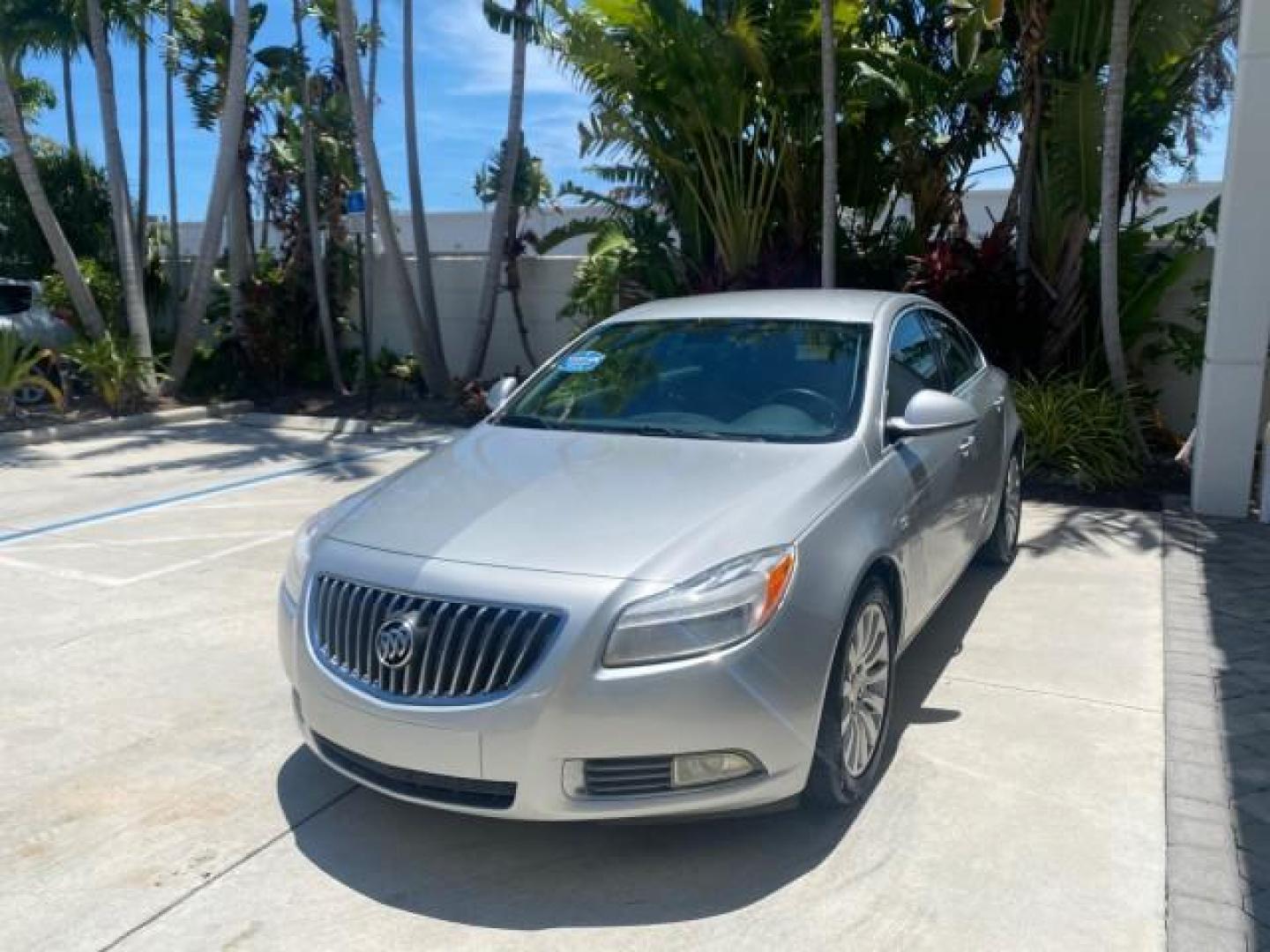 2011 Quicksilver Metallic /Ebony Buick Regal CXL LOW MILES 66,819 (W04GN5EC3B1) with an 2.4L Ecotec DOHC 4-Cyl SIDI Spark Ignition DI Engine engine, Automatic transmission, located at 4701 North Dixie Hwy, Pompano Beach, FL, 33064, (954) 422-2889, 26.240938, -80.123474 - OUR WEBPAGE FLORIDACARS1.COM HAS OVER 100 PHOTOS AND FREE CARFAX LINK 2011 BUICK REGAL CXL VIN: W04GN5EC3B1005460 W 0 4 G N 5 E C 3 B 1 0 0 5 4 6 0 SEDAN 4 DR 2.4L I4 F DOHC 16V 30 MPG GASOLINE FRONT WHEEL DRIVE Top Features Alloy Wheels Bluetooth Technology Comfort Package Convenience Package Front - Photo#3