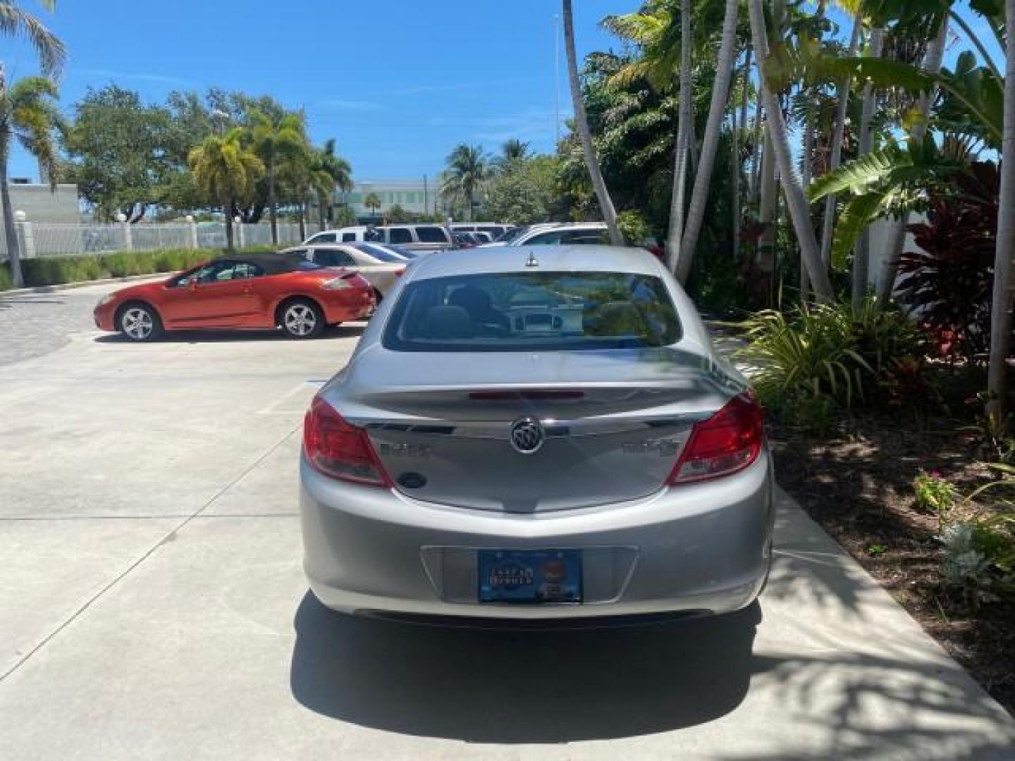 2011 Quicksilver Metallic /Ebony Buick Regal CXL LOW MILES 66,819 (W04GN5EC3B1) with an 2.4L Ecotec DOHC 4-Cyl SIDI Spark Ignition DI Engine engine, Automatic transmission, located at 4701 North Dixie Hwy, Pompano Beach, FL, 33064, (954) 422-2889, 26.240938, -80.123474 - OUR WEBPAGE FLORIDACARS1.COM HAS OVER 100 PHOTOS AND FREE CARFAX LINK 2011 BUICK REGAL CXL VIN: W04GN5EC3B1005460 W 0 4 G N 5 E C 3 B 1 0 0 5 4 6 0 SEDAN 4 DR 2.4L I4 F DOHC 16V 30 MPG GASOLINE FRONT WHEEL DRIVE Top Features Alloy Wheels Bluetooth Technology Comfort Package Convenience Package Front - Photo#6