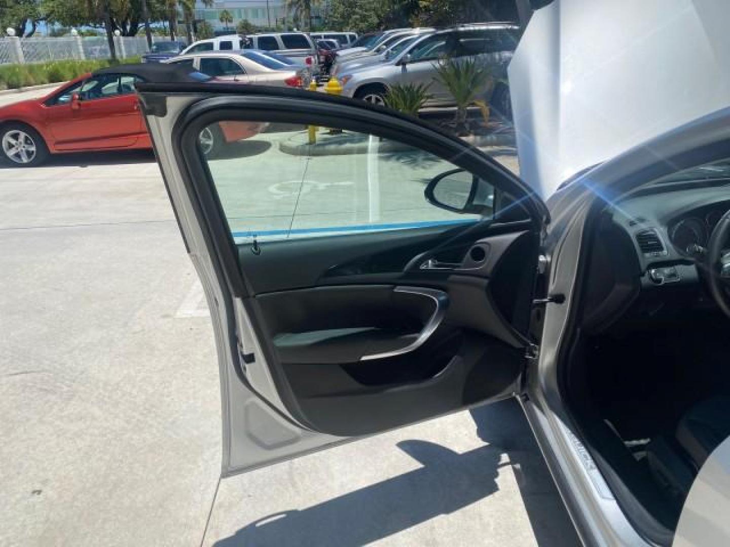 2011 Quicksilver Metallic /Ebony Buick Regal CXL LOW MILES 66,819 (W04GN5EC3B1) with an 2.4L Ecotec DOHC 4-Cyl SIDI Spark Ignition DI Engine engine, Automatic transmission, located at 4701 North Dixie Hwy, Pompano Beach, FL, 33064, (954) 422-2889, 26.240938, -80.123474 - OUR WEBPAGE FLORIDACARS1.COM HAS OVER 100 PHOTOS AND FREE CARFAX LINK 2011 BUICK REGAL CXL VIN: W04GN5EC3B1005460 W 0 4 G N 5 E C 3 B 1 0 0 5 4 6 0 SEDAN 4 DR 2.4L I4 F DOHC 16V 30 MPG GASOLINE FRONT WHEEL DRIVE Top Features Alloy Wheels Bluetooth Technology Comfort Package Convenience Package Front - Photo#9