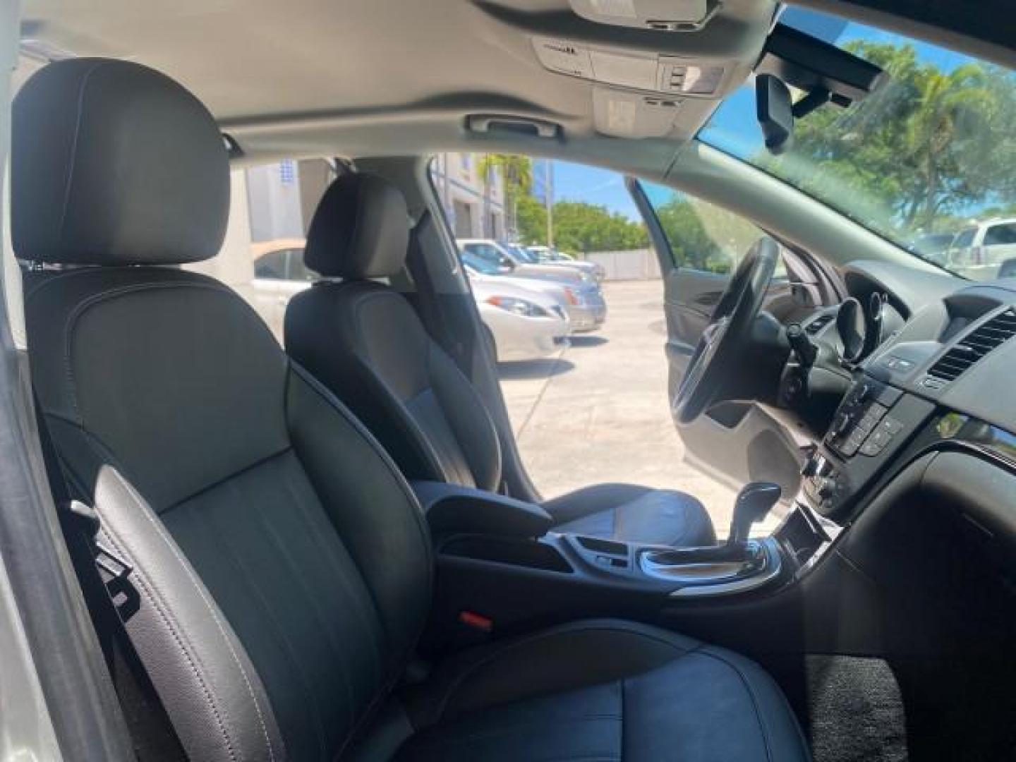 2011 Quicksilver Metallic /Ebony Buick Regal CXL LOW MILES 66,819 (W04GN5EC3B1) with an 2.4L Ecotec DOHC 4-Cyl SIDI Spark Ignition DI Engine engine, Automatic transmission, located at 4701 North Dixie Hwy, Pompano Beach, FL, 33064, (954) 422-2889, 26.240938, -80.123474 - OUR WEBPAGE FLORIDACARS1.COM HAS OVER 100 PHOTOS AND FREE CARFAX LINK 2011 BUICK REGAL CXL VIN: W04GN5EC3B1005460 W 0 4 G N 5 E C 3 B 1 0 0 5 4 6 0 SEDAN 4 DR 2.4L I4 F DOHC 16V 30 MPG GASOLINE FRONT WHEEL DRIVE Top Features Alloy Wheels Bluetooth Technology Comfort Package Convenience Package Front - Photo#12