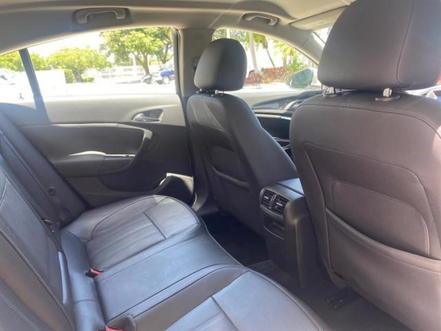 2011 Quicksilver Metallic /Ebony Buick Regal CXL LOW MILES 66,819 (W04GN5EC3B1) with an 2.4L Ecotec DOHC 4-Cyl SIDI Spark Ignition DI Engine engine, Automatic transmission, located at 4701 North Dixie Hwy, Pompano Beach, FL, 33064, (954) 422-2889, 26.240938, -80.123474 - OUR WEBPAGE FLORIDACARS1.COM HAS OVER 100 PHOTOS AND FREE CARFAX LINK 2011 BUICK REGAL CXL VIN: W04GN5EC3B1005460 W 0 4 G N 5 E C 3 B 1 0 0 5 4 6 0 SEDAN 4 DR 2.4L I4 F DOHC 16V 30 MPG GASOLINE FRONT WHEEL DRIVE Top Features Alloy Wheels Bluetooth Technology Comfort Package Convenience Package Front - Photo#87