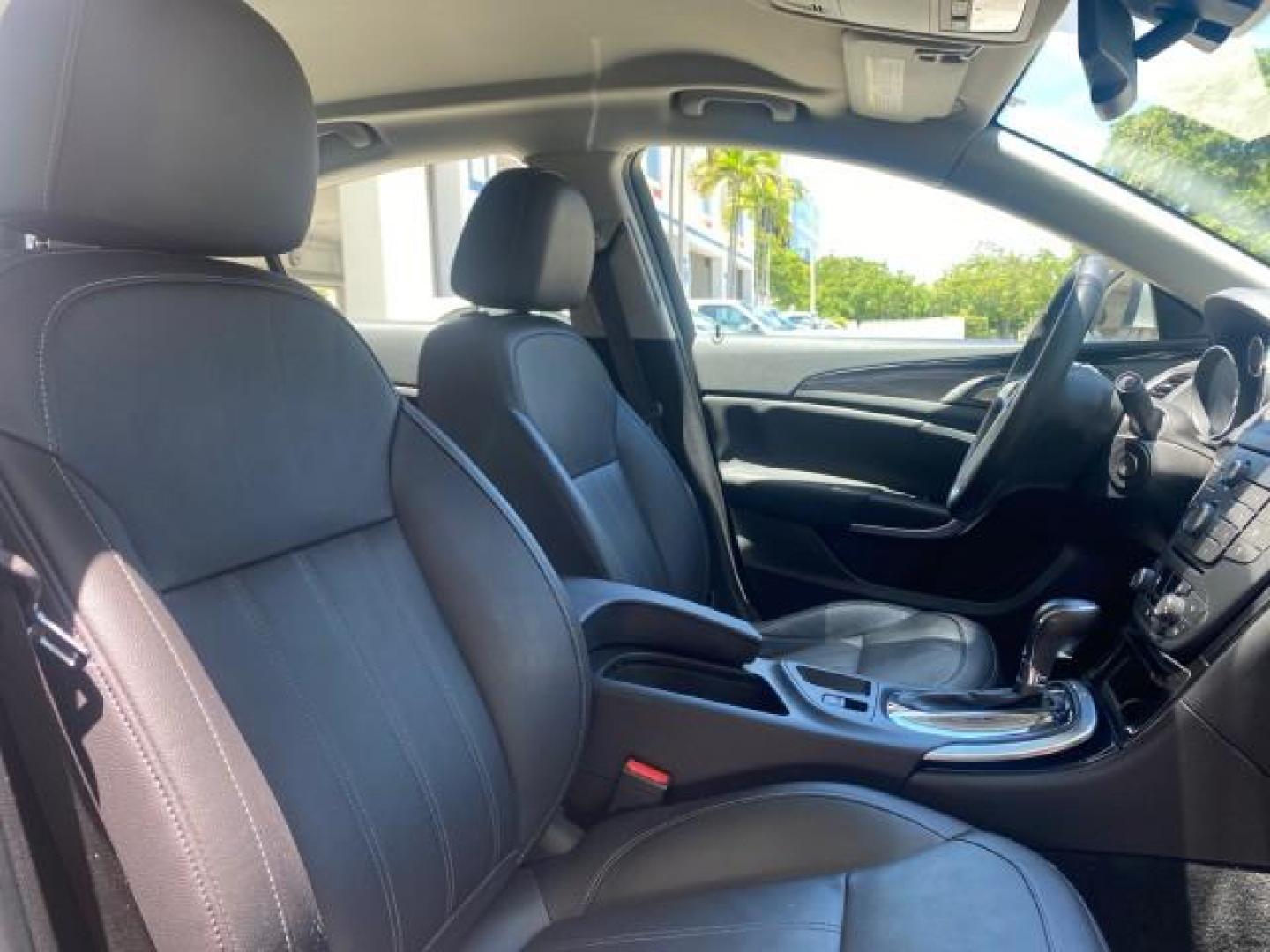 2011 Quicksilver Metallic /Ebony Buick Regal CXL LOW MILES 66,819 (W04GN5EC3B1) with an 2.4L Ecotec DOHC 4-Cyl SIDI Spark Ignition DI Engine engine, Automatic transmission, located at 4701 North Dixie Hwy, Pompano Beach, FL, 33064, (954) 422-2889, 26.240938, -80.123474 - OUR WEBPAGE FLORIDACARS1.COM HAS OVER 100 PHOTOS AND FREE CARFAX LINK 2011 BUICK REGAL CXL VIN: W04GN5EC3B1005460 W 0 4 G N 5 E C 3 B 1 0 0 5 4 6 0 SEDAN 4 DR 2.4L I4 F DOHC 16V 30 MPG GASOLINE FRONT WHEEL DRIVE Top Features Alloy Wheels Bluetooth Technology Comfort Package Convenience Package Front - Photo#93