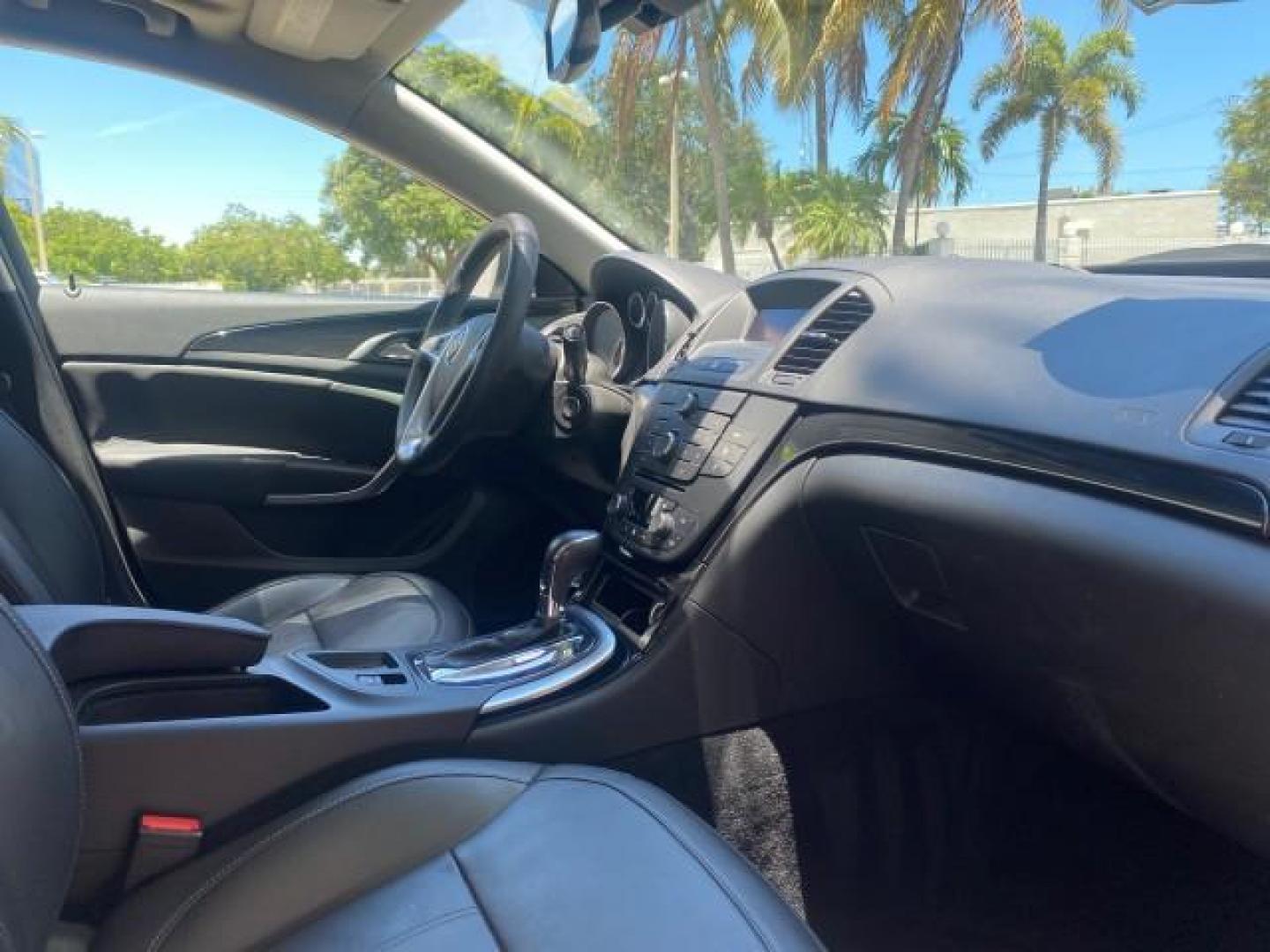 2011 Quicksilver Metallic /Ebony Buick Regal CXL LOW MILES 66,819 (W04GN5EC3B1) with an 2.4L Ecotec DOHC 4-Cyl SIDI Spark Ignition DI Engine engine, Automatic transmission, located at 4701 North Dixie Hwy, Pompano Beach, FL, 33064, (954) 422-2889, 26.240938, -80.123474 - OUR WEBPAGE FLORIDACARS1.COM HAS OVER 100 PHOTOS AND FREE CARFAX LINK 2011 BUICK REGAL CXL VIN: W04GN5EC3B1005460 W 0 4 G N 5 E C 3 B 1 0 0 5 4 6 0 SEDAN 4 DR 2.4L I4 F DOHC 16V 30 MPG GASOLINE FRONT WHEEL DRIVE Top Features Alloy Wheels Bluetooth Technology Comfort Package Convenience Package Front - Photo#97