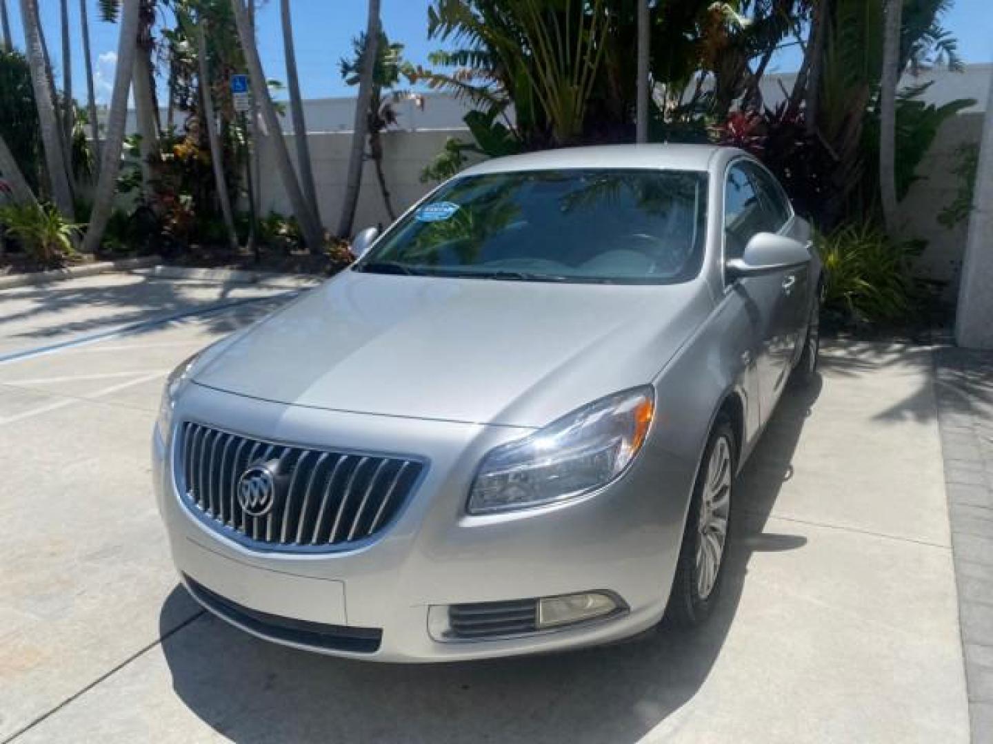 2011 Quicksilver Metallic /Ebony Buick Regal CXL LOW MILES 66,819 (W04GN5EC3B1) with an 2.4L Ecotec DOHC 4-Cyl SIDI Spark Ignition DI Engine engine, Automatic transmission, located at 4701 North Dixie Hwy, Pompano Beach, FL, 33064, (954) 422-2889, 26.240938, -80.123474 - OUR WEBPAGE FLORIDACARS1.COM HAS OVER 100 PHOTOS AND FREE CARFAX LINK 2011 BUICK REGAL CXL VIN: W04GN5EC3B1005460 W 0 4 G N 5 E C 3 B 1 0 0 5 4 6 0 SEDAN 4 DR 2.4L I4 F DOHC 16V 30 MPG GASOLINE FRONT WHEEL DRIVE Top Features Alloy Wheels Bluetooth Technology Comfort Package Convenience Package Front - Photo#3