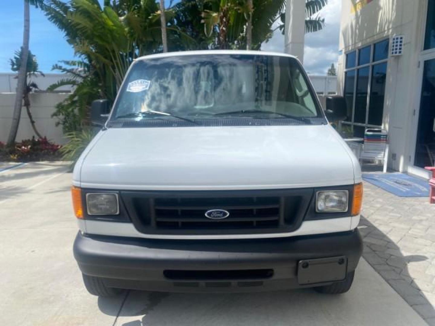 2006 Oxford White /Medium Flint Ford Econoline Cargo Van E350 LOW MILES 66,160 (1FTSE34L56D) with an 5.4L SOHC EFI V8 Triton Engine engine, Automatic transmission, located at 4701 North Dixie Hwy, Pompano Beach, FL, 33064, (954) 422-2889, 26.240938, -80.123474 - OUR WEBPAGE FLORIDACARS1.COM HAS OVER 100 PHOTOS AND FREE CARFAX LINK 2006 FORD E-SERIES E-350 SD CARGO VIN: 1FTSE34L56DB06011 1 F T S E 3 4 L 5 6 D B 0 6 0 1 1 VAN 5.4L V8 F GASOLINE REAR WHEEL DRIVE Top Features Vinyl Seats Basic Features ABS Brakes AM/FM Stereo Air Conditioning Automatic Transmis - Photo#2