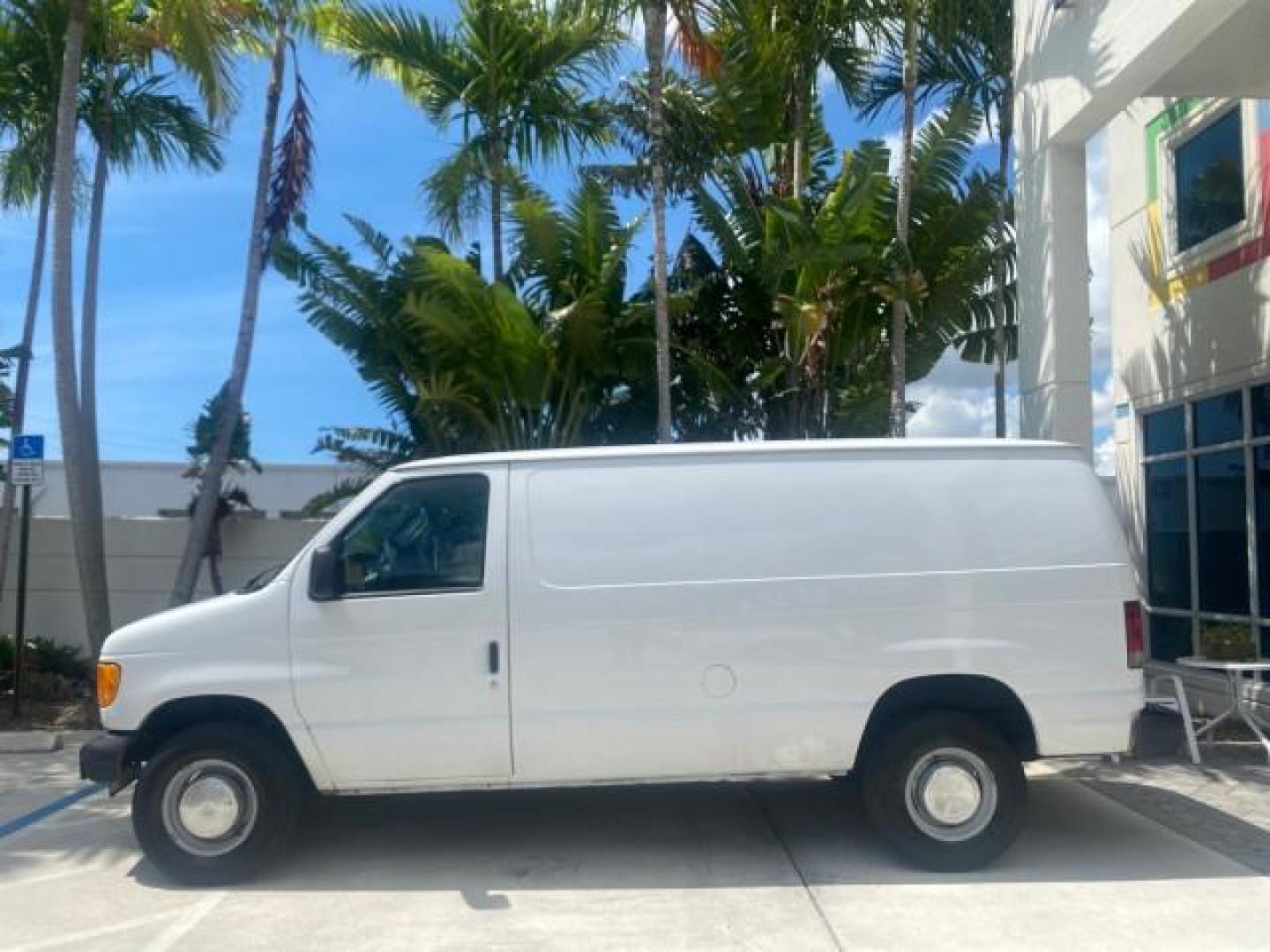 2006 Oxford White /Medium Flint Ford Econoline Cargo Van E350 LOW MILES 66,160 (1FTSE34L56D) with an 5.4L SOHC EFI V8 Triton Engine engine, Automatic transmission, located at 4701 North Dixie Hwy, Pompano Beach, FL, 33064, (954) 422-2889, 26.240938, -80.123474 - OUR WEBPAGE FLORIDACARS1.COM HAS OVER 100 PHOTOS AND FREE CARFAX LINK 2006 FORD E-SERIES E-350 SD CARGO VIN: 1FTSE34L56DB06011 1 F T S E 3 4 L 5 6 D B 0 6 0 1 1 VAN 5.4L V8 F GASOLINE REAR WHEEL DRIVE Top Features Vinyl Seats Basic Features ABS Brakes AM/FM Stereo Air Conditioning Automatic Transmis - Photo#4
