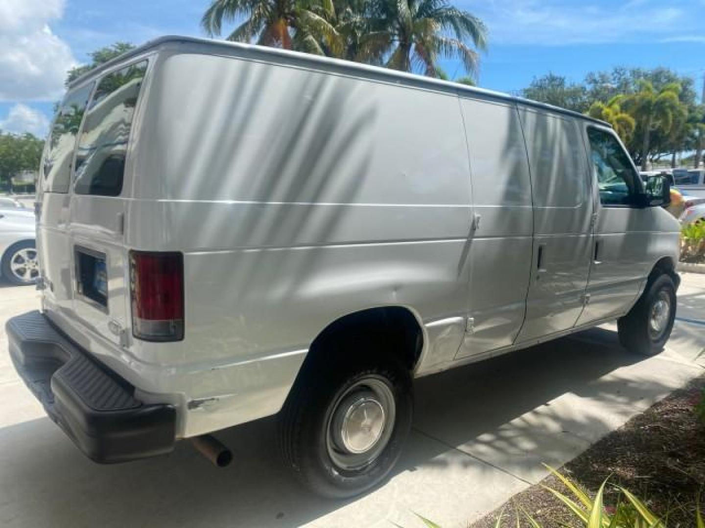 2006 Oxford White /Medium Flint Ford Econoline Cargo Van E350 LOW MILES 66,160 (1FTSE34L56D) with an 5.4L SOHC EFI V8 Triton Engine engine, Automatic transmission, located at 4701 North Dixie Hwy, Pompano Beach, FL, 33064, (954) 422-2889, 26.240938, -80.123474 - OUR WEBPAGE FLORIDACARS1.COM HAS OVER 100 PHOTOS AND FREE CARFAX LINK 2006 FORD E-SERIES E-350 SD CARGO VIN: 1FTSE34L56DB06011 1 F T S E 3 4 L 5 6 D B 0 6 0 1 1 VAN 5.4L V8 F GASOLINE REAR WHEEL DRIVE Top Features Vinyl Seats Basic Features ABS Brakes AM/FM Stereo Air Conditioning Automatic Transmis - Photo#7