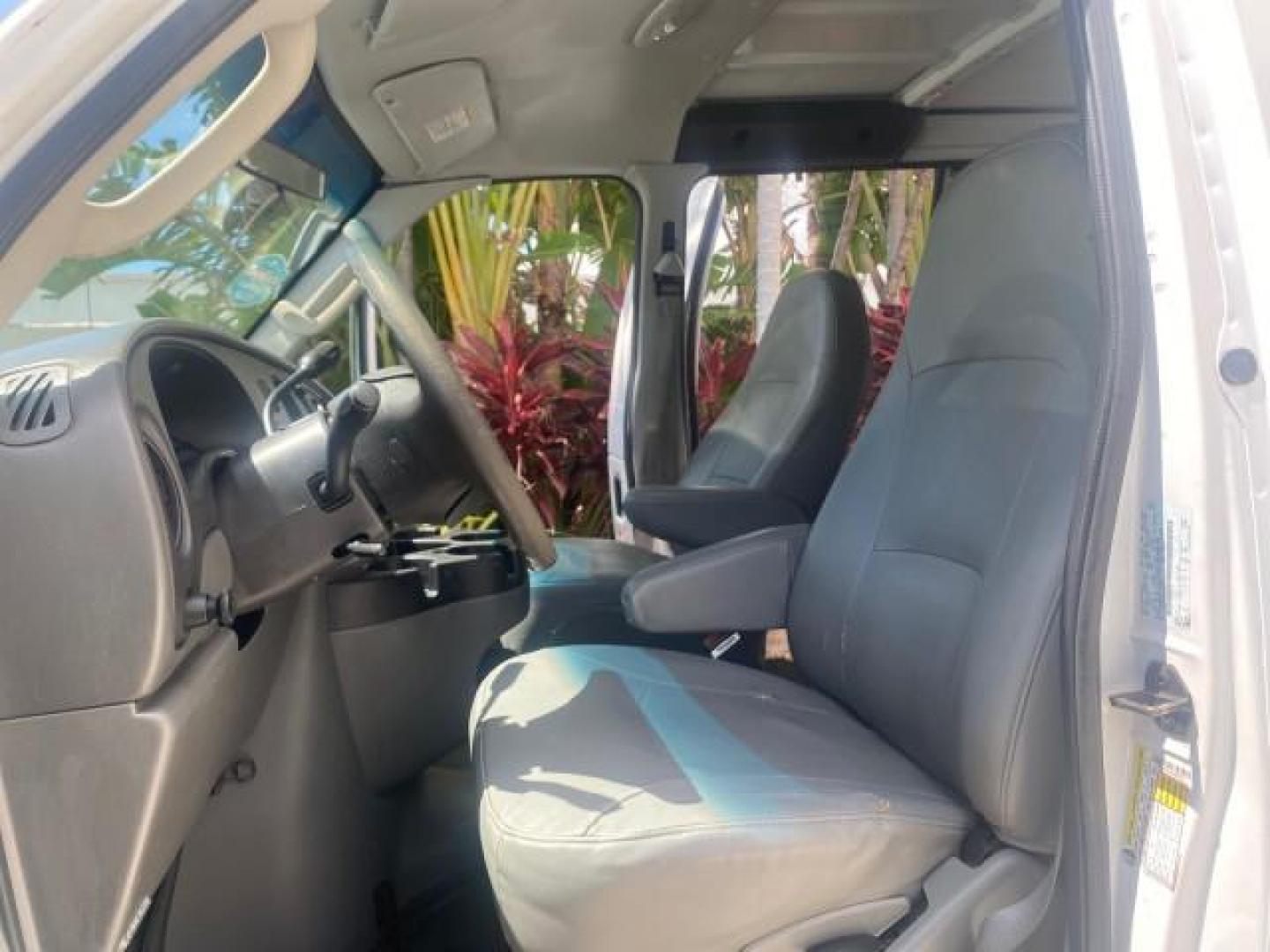 2006 Oxford White /Medium Flint Ford Econoline Cargo Van E350 LOW MILES 66,160 (1FTSE34L56D) with an 5.4L SOHC EFI V8 Triton Engine engine, Automatic transmission, located at 4701 North Dixie Hwy, Pompano Beach, FL, 33064, (954) 422-2889, 26.240938, -80.123474 - OUR WEBPAGE FLORIDACARS1.COM HAS OVER 100 PHOTOS AND FREE CARFAX LINK 2006 FORD E-SERIES E-350 SD CARGO VIN: 1FTSE34L56DB06011 1 F T S E 3 4 L 5 6 D B 0 6 0 1 1 VAN 5.4L V8 F GASOLINE REAR WHEEL DRIVE Top Features Vinyl Seats Basic Features ABS Brakes AM/FM Stereo Air Conditioning Automatic Transmis - Photo#10