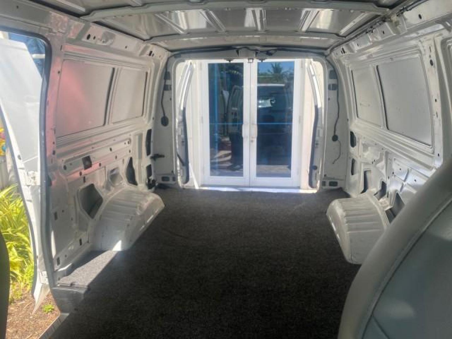 2006 Oxford White /Medium Flint Ford Econoline Cargo Van E350 LOW MILES 66,160 (1FTSE34L56D) with an 5.4L SOHC EFI V8 Triton Engine engine, Automatic transmission, located at 4701 North Dixie Hwy, Pompano Beach, FL, 33064, (954) 422-2889, 26.240938, -80.123474 - OUR WEBPAGE FLORIDACARS1.COM HAS OVER 100 PHOTOS AND FREE CARFAX LINK 2006 FORD E-SERIES E-350 SD CARGO VIN: 1FTSE34L56DB06011 1 F T S E 3 4 L 5 6 D B 0 6 0 1 1 VAN 5.4L V8 F GASOLINE REAR WHEEL DRIVE Top Features Vinyl Seats Basic Features ABS Brakes AM/FM Stereo Air Conditioning Automatic Transmis - Photo#13